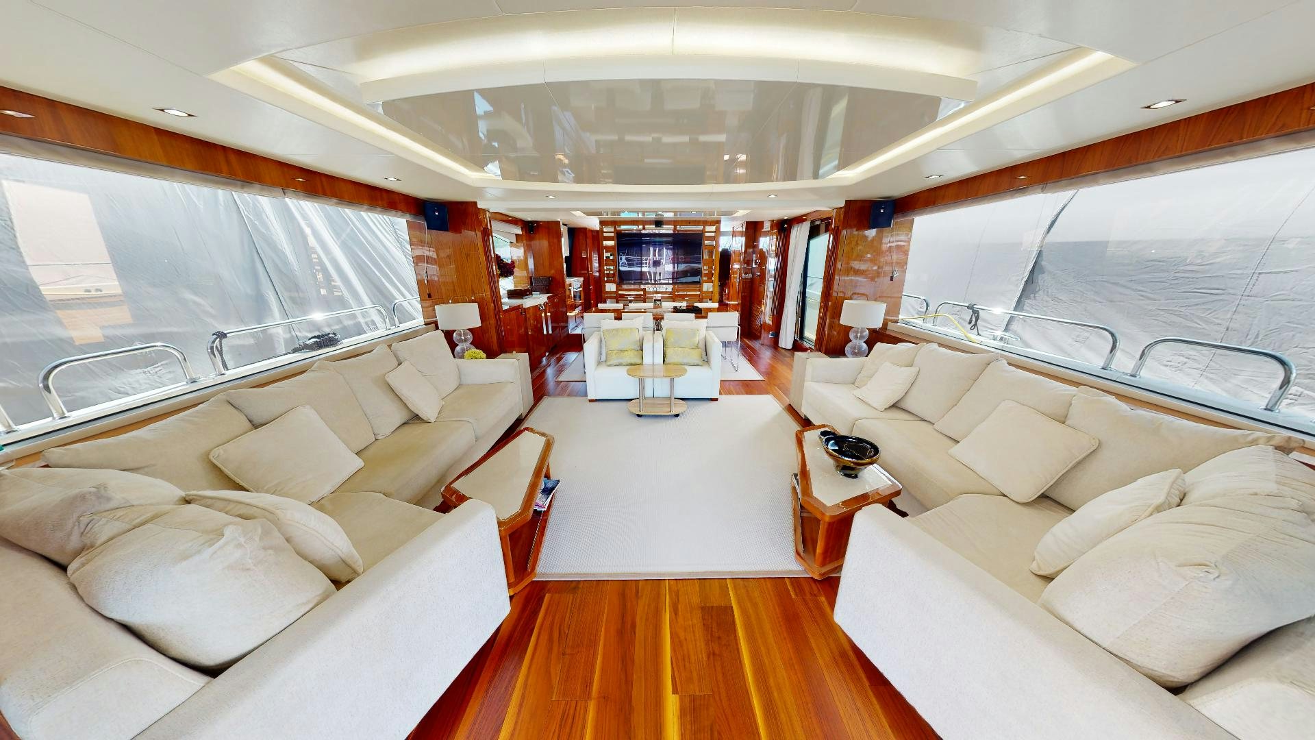 a large room with a couch and a table aboard A & K Yacht for Sale