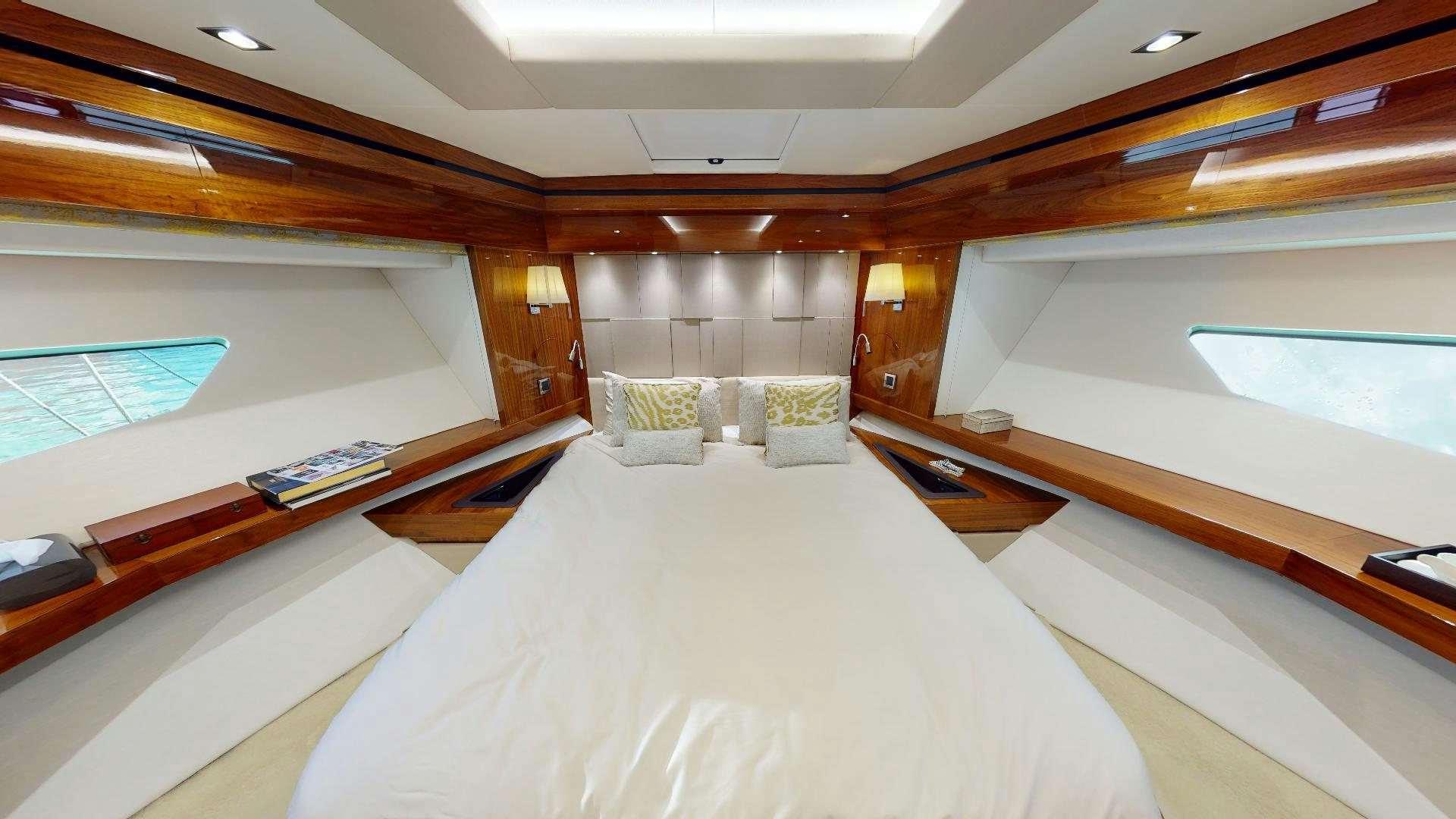 a room with a bed and a window aboard A & K Yacht for Sale