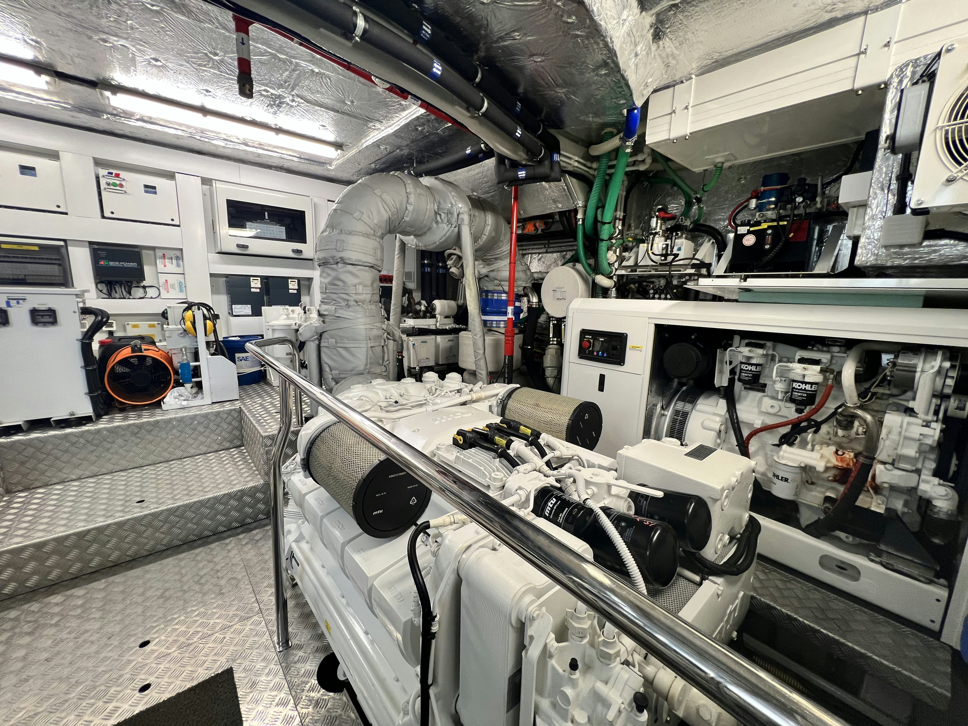a room with machinery aboard A & K Yacht for Sale