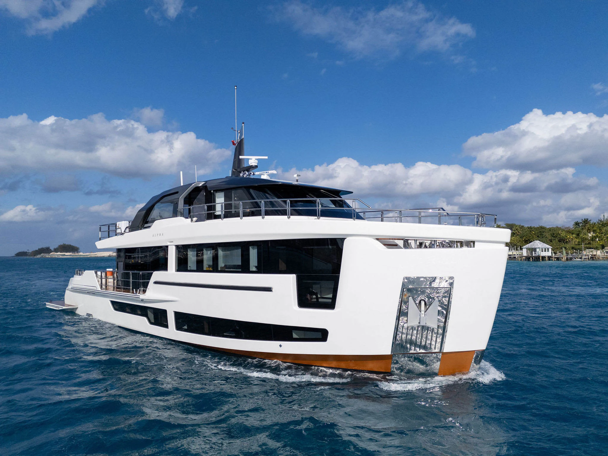 a white boat in the water aboard ANDREIKA V Yacht for Charter
