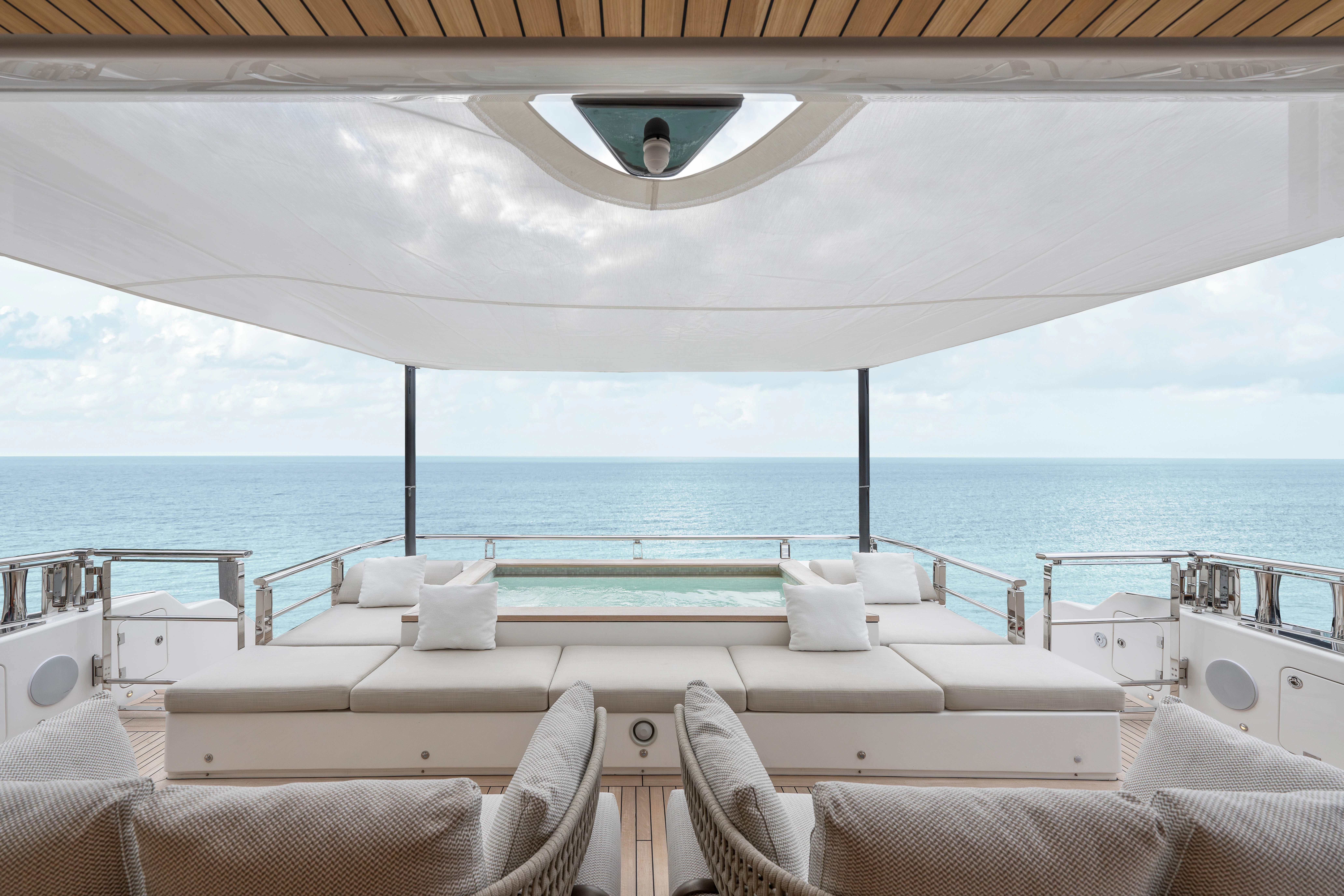 a large white boat on a body of water aboard ANDREIKA V Yacht for Charter