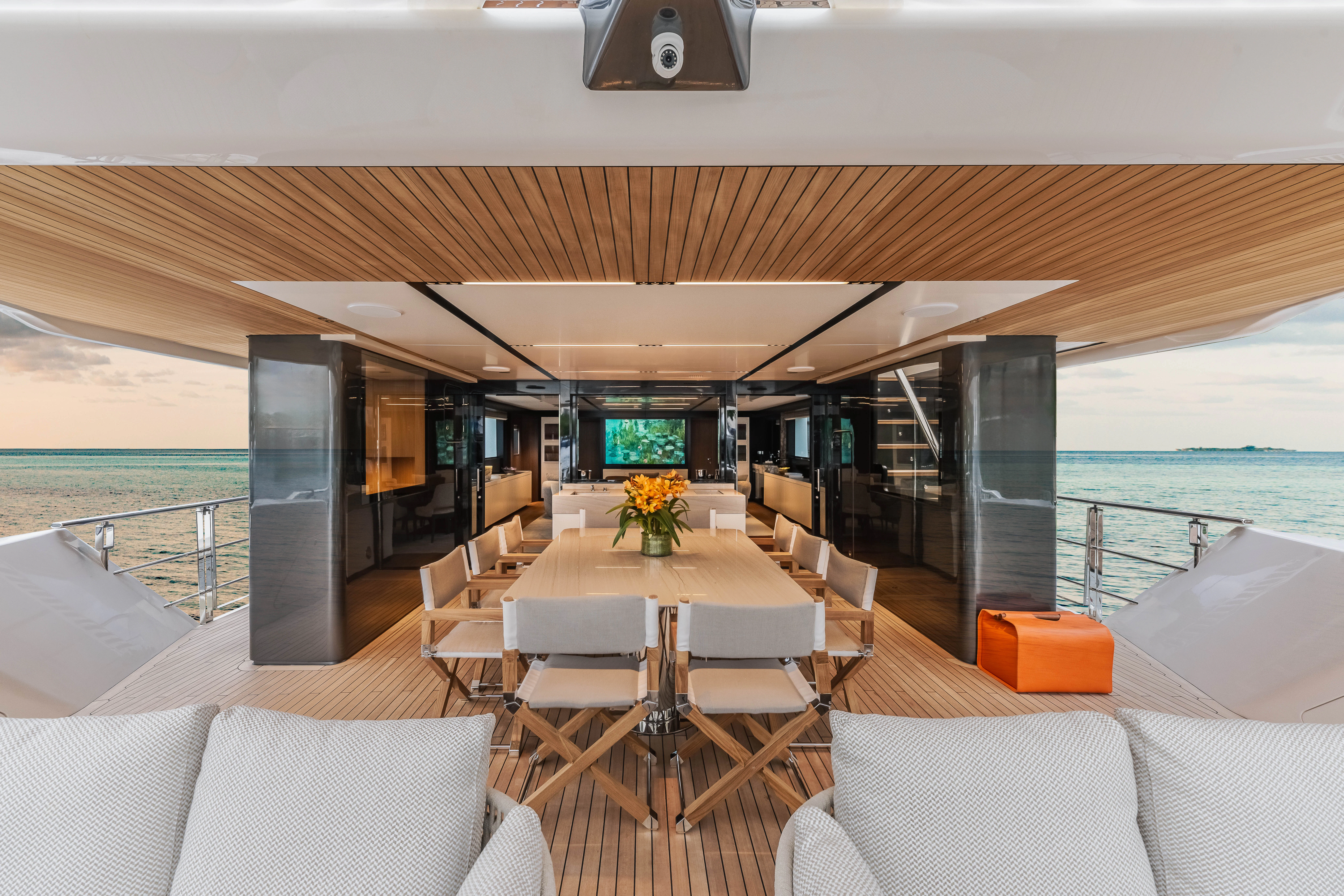 a room with tables and chairs aboard ANDREIKA V Yacht for Charter