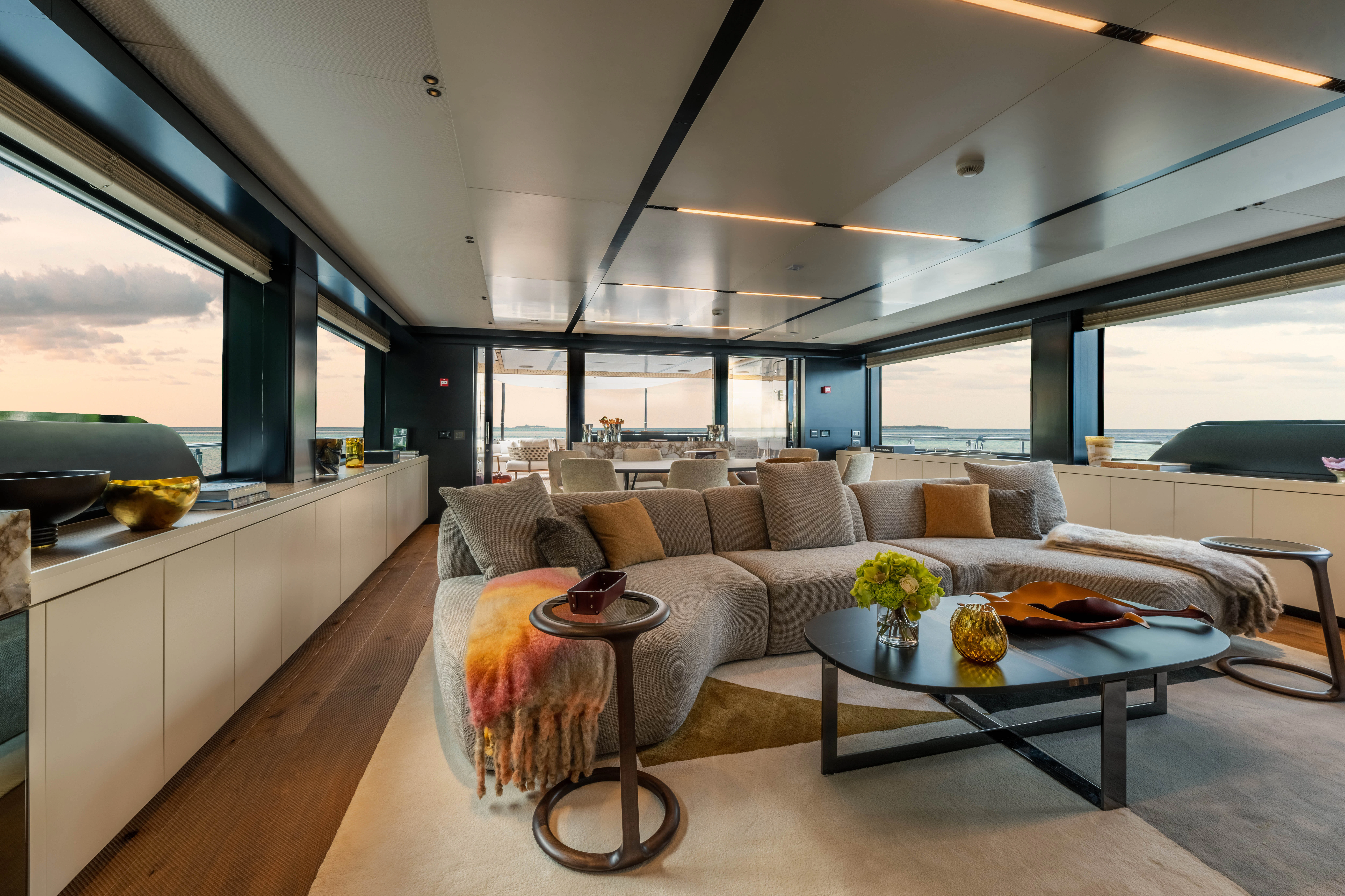 a living room with a couch and a table aboard ANDREIKA V Yacht for Charter