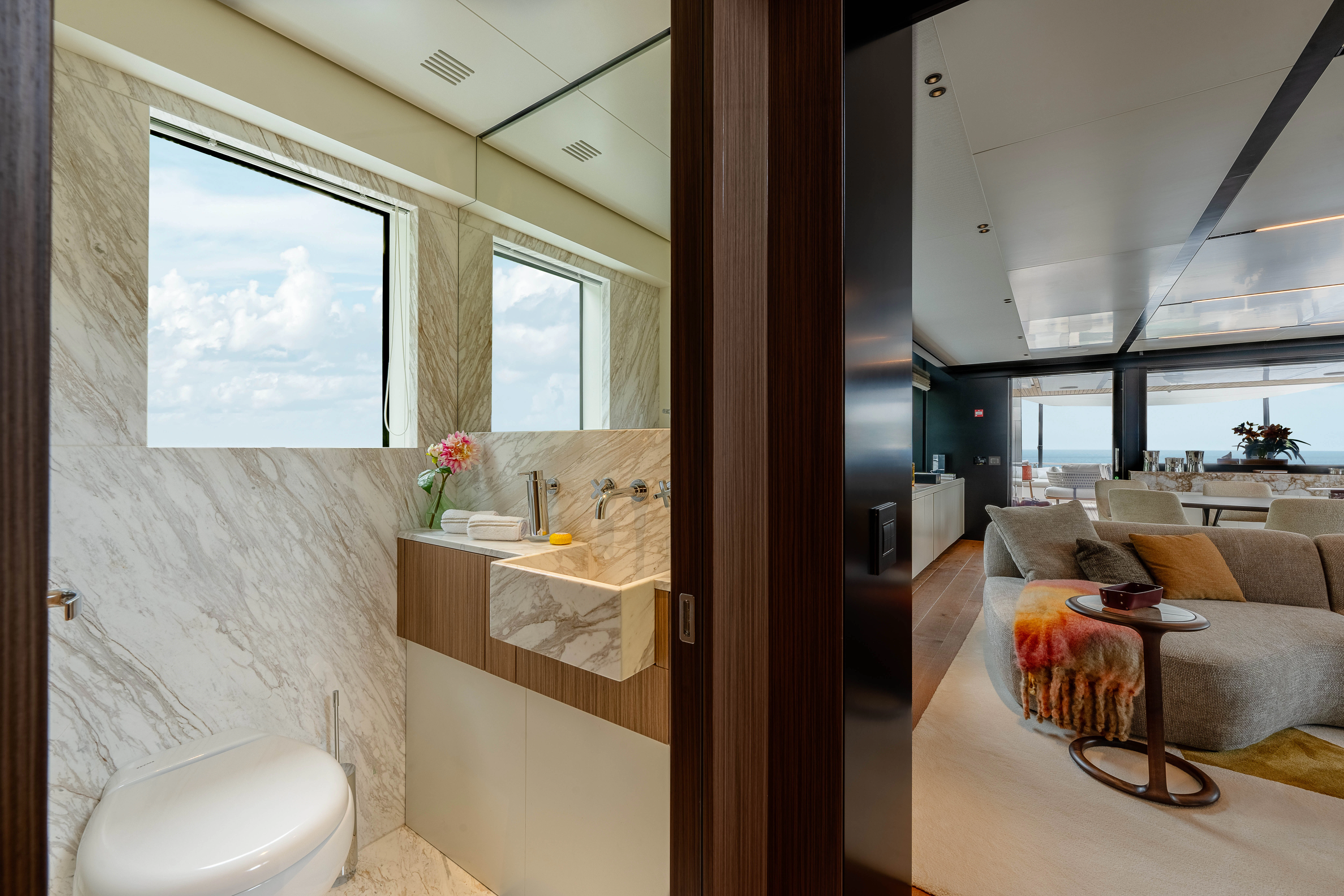 a bathroom with a large window aboard ANDREIKA V Yacht for Charter