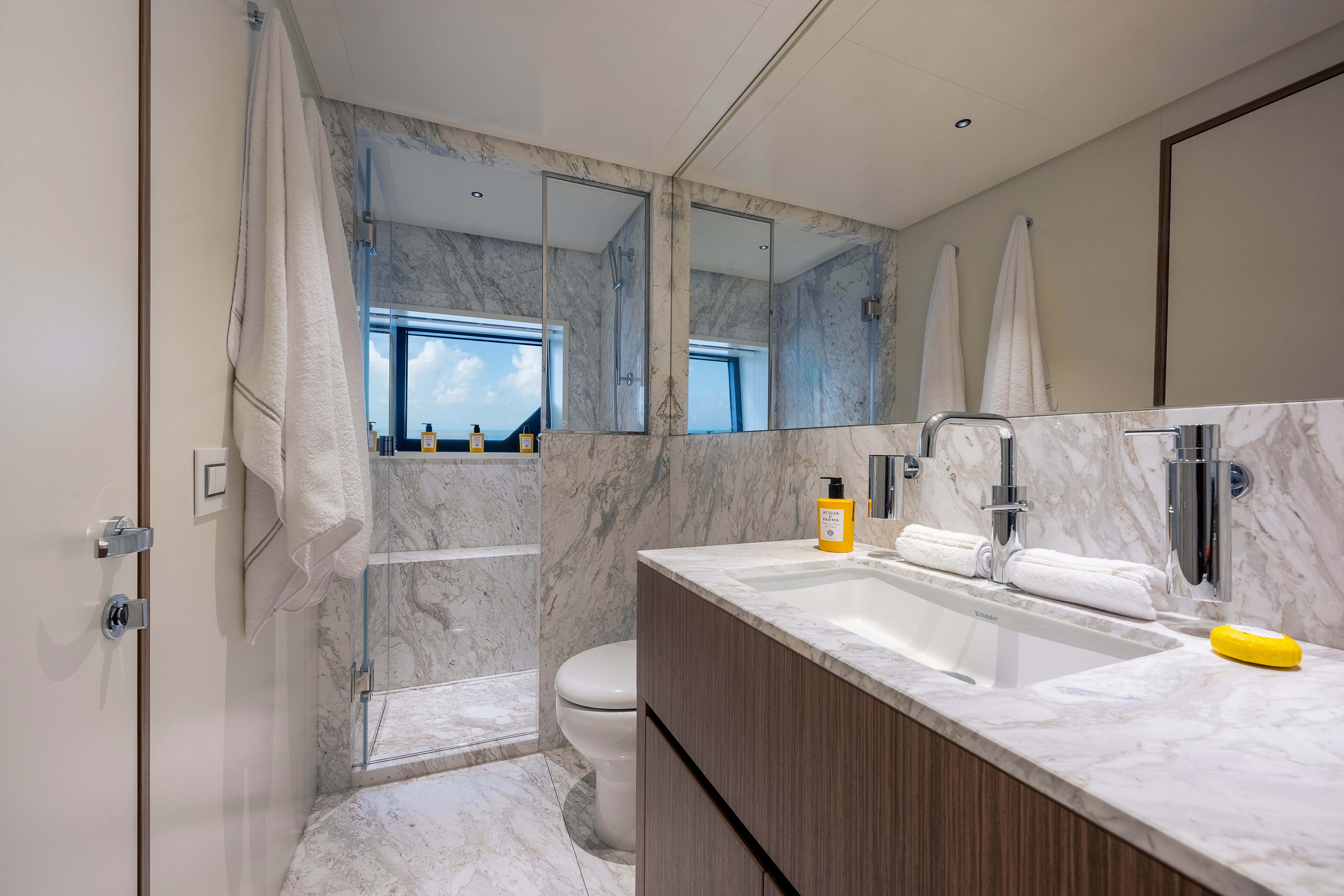 a bathroom with a large mirror aboard ANDREIKA V Yacht for Charter