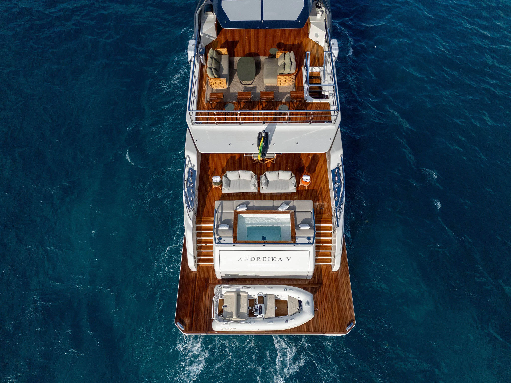 a small wooden boat aboard ANDREIKA V Yacht for Charter