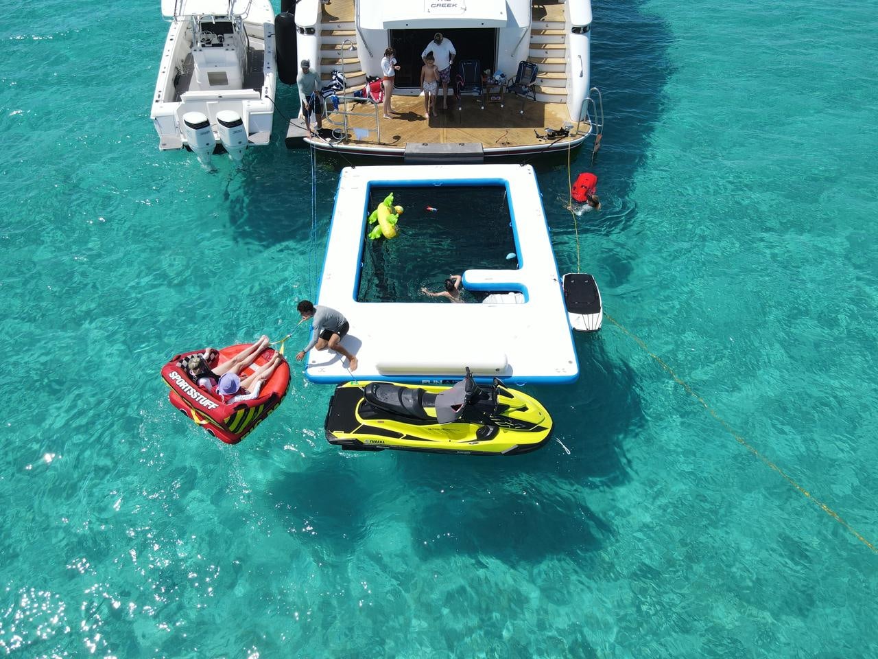 a boat with a person in it aboard IMPROMPTU Yacht for Charter