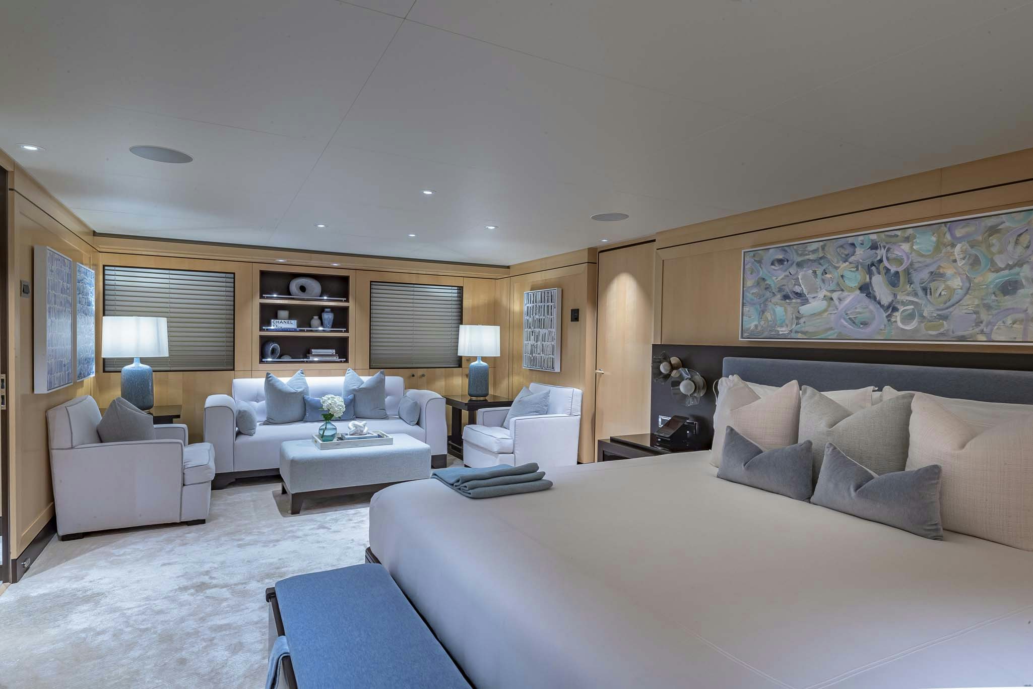 a large bedroom with a large bed aboard REVELRY Yacht for Charter