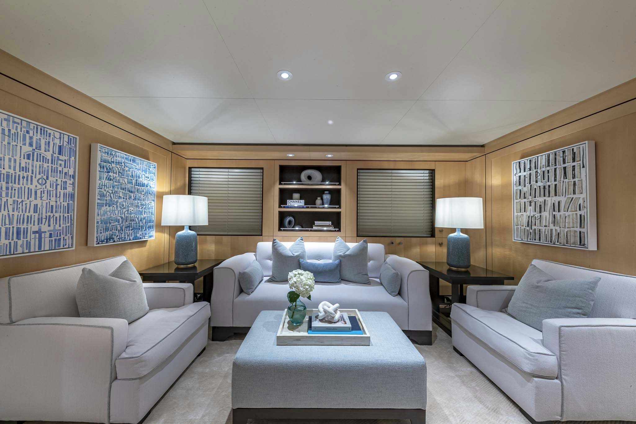 a living room with a couch and a coffee table aboard REVELRY Yacht for Charter