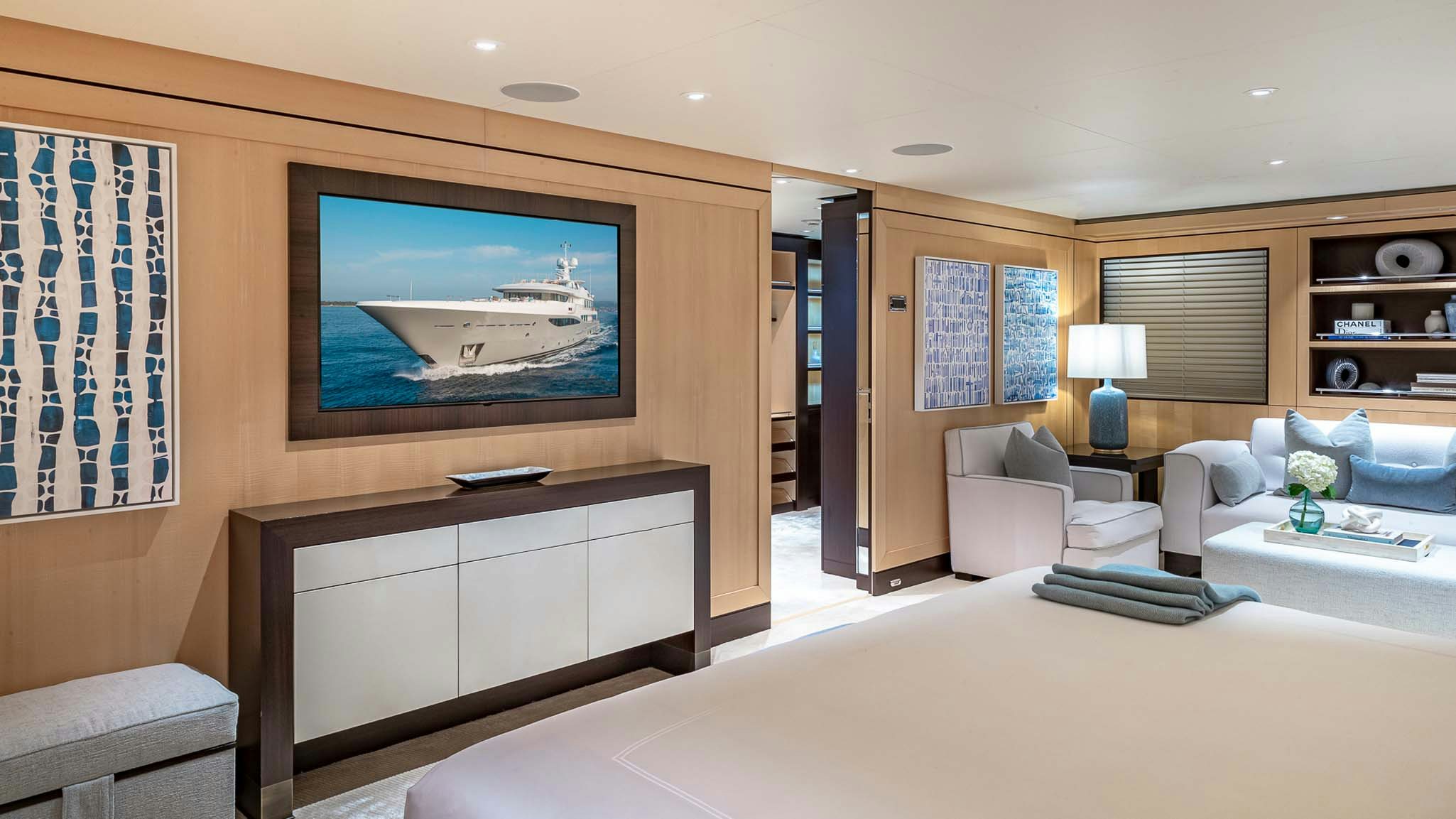 a large bedroom with a large bed aboard REVELRY Yacht for Charter
