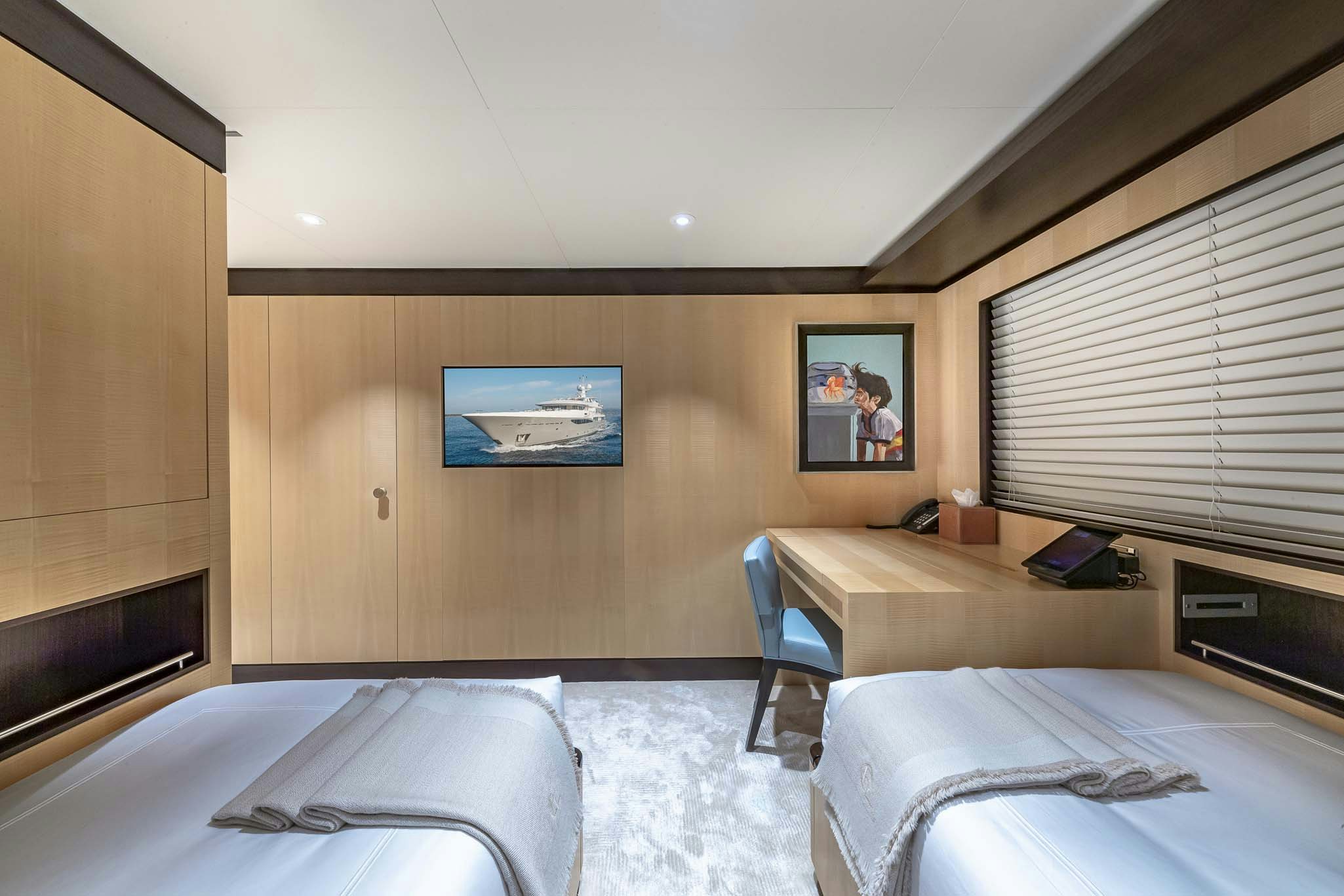 a room with two beds aboard REVELRY Yacht for Charter
