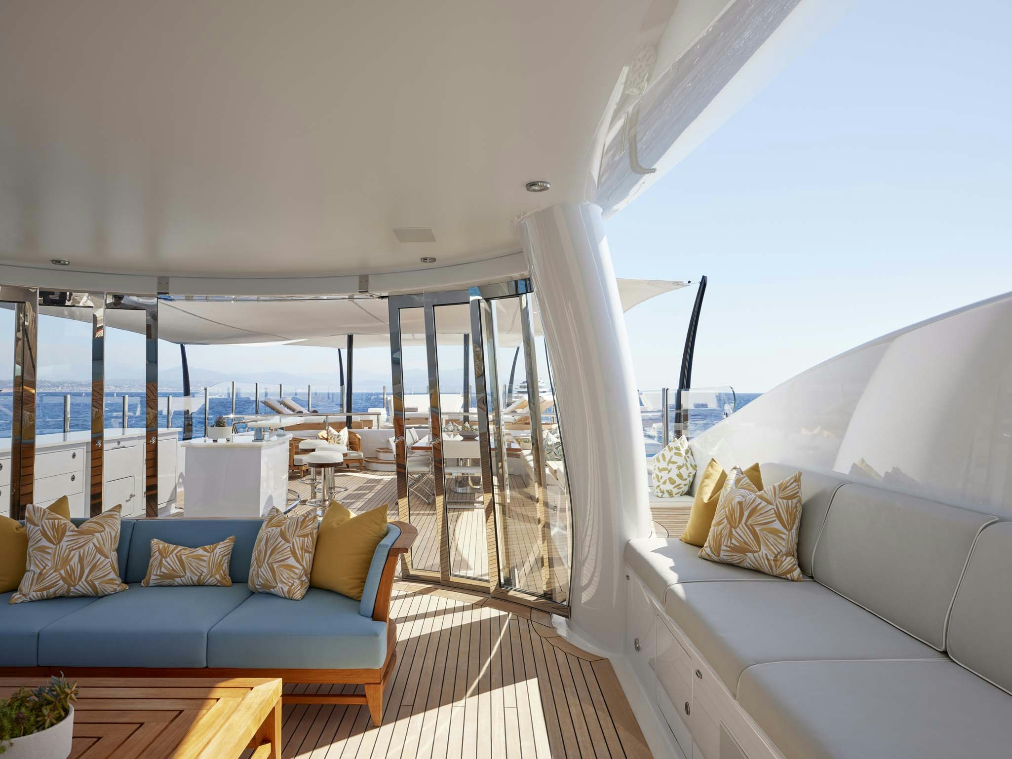 a living room with a large window aboard REVELRY Yacht for Charter