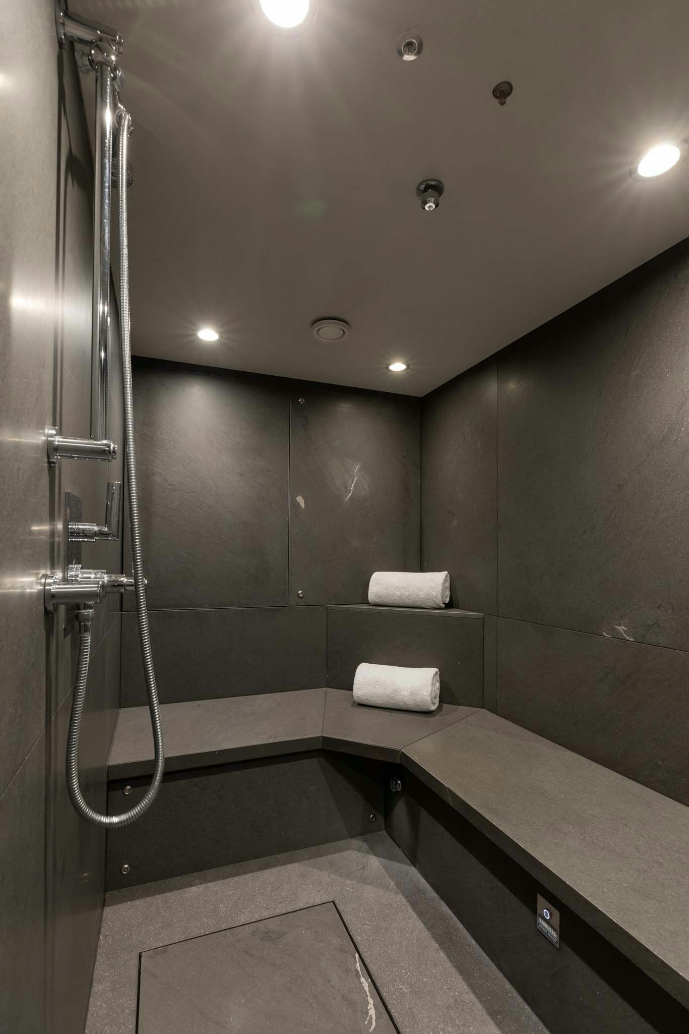 a bathroom with a shower aboard REVELRY Yacht for Charter