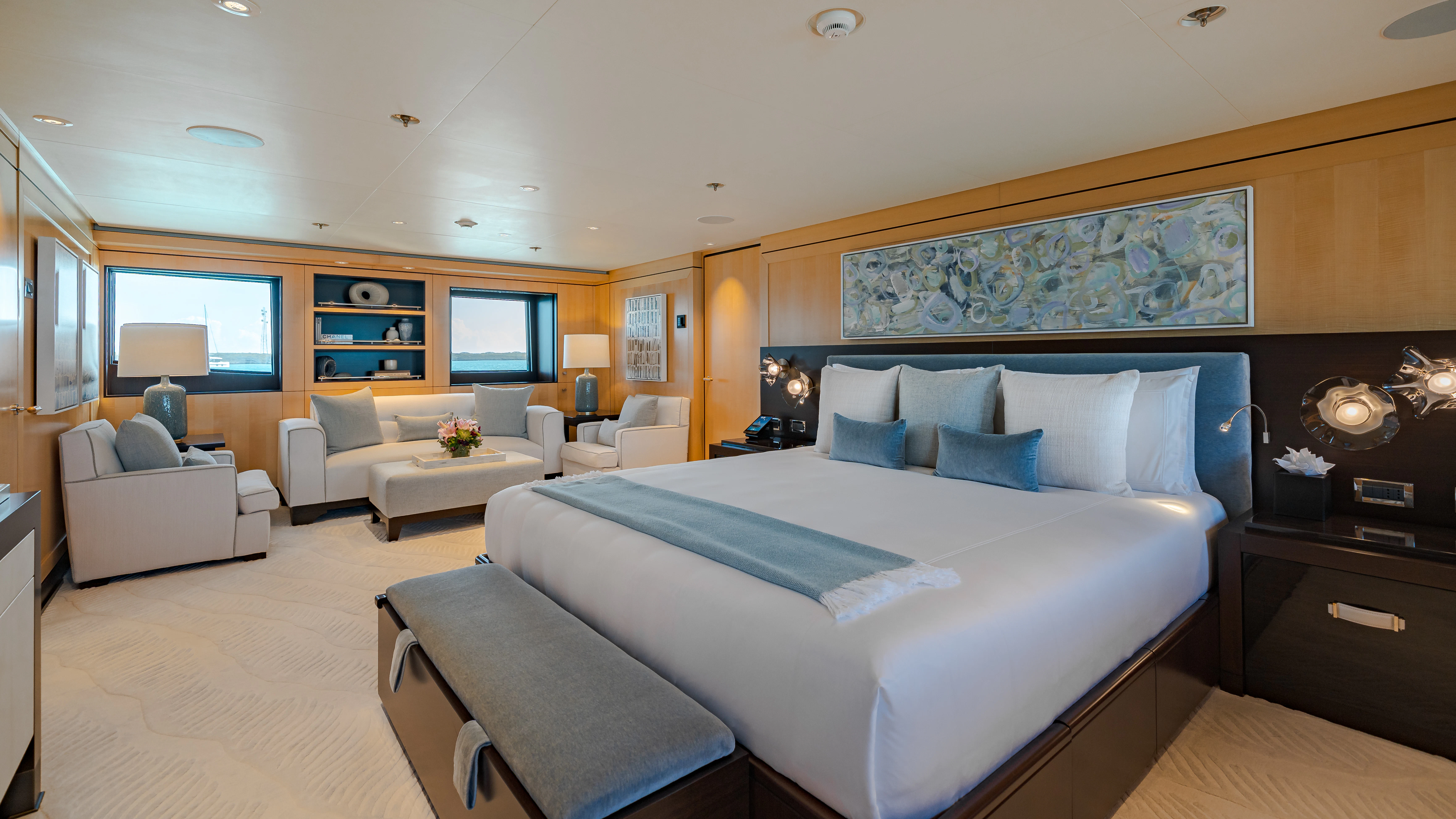 a large bedroom with a large bed aboard REVELRY Yacht for Charter