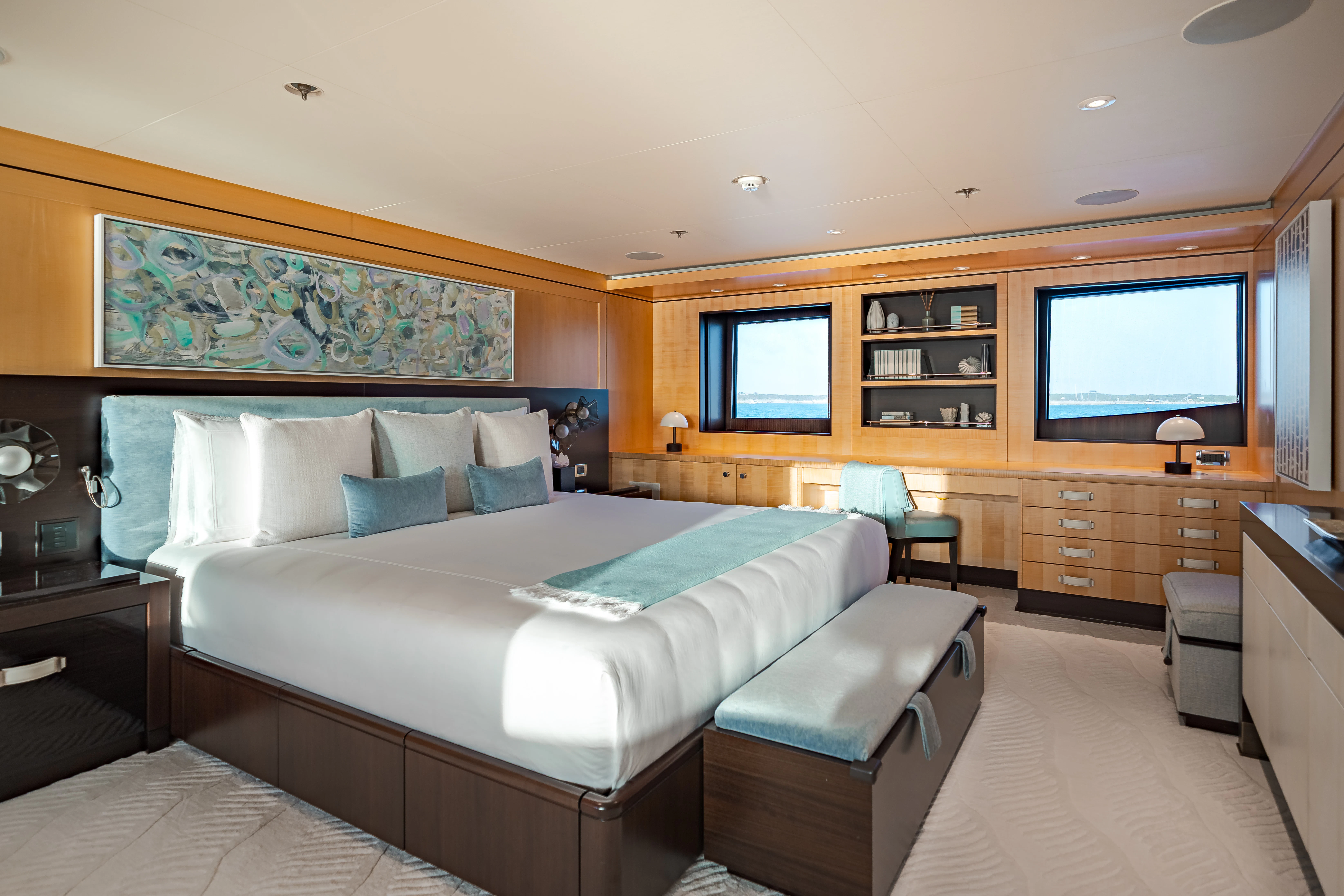 a large bedroom with a large bed aboard REVELRY Yacht for Charter