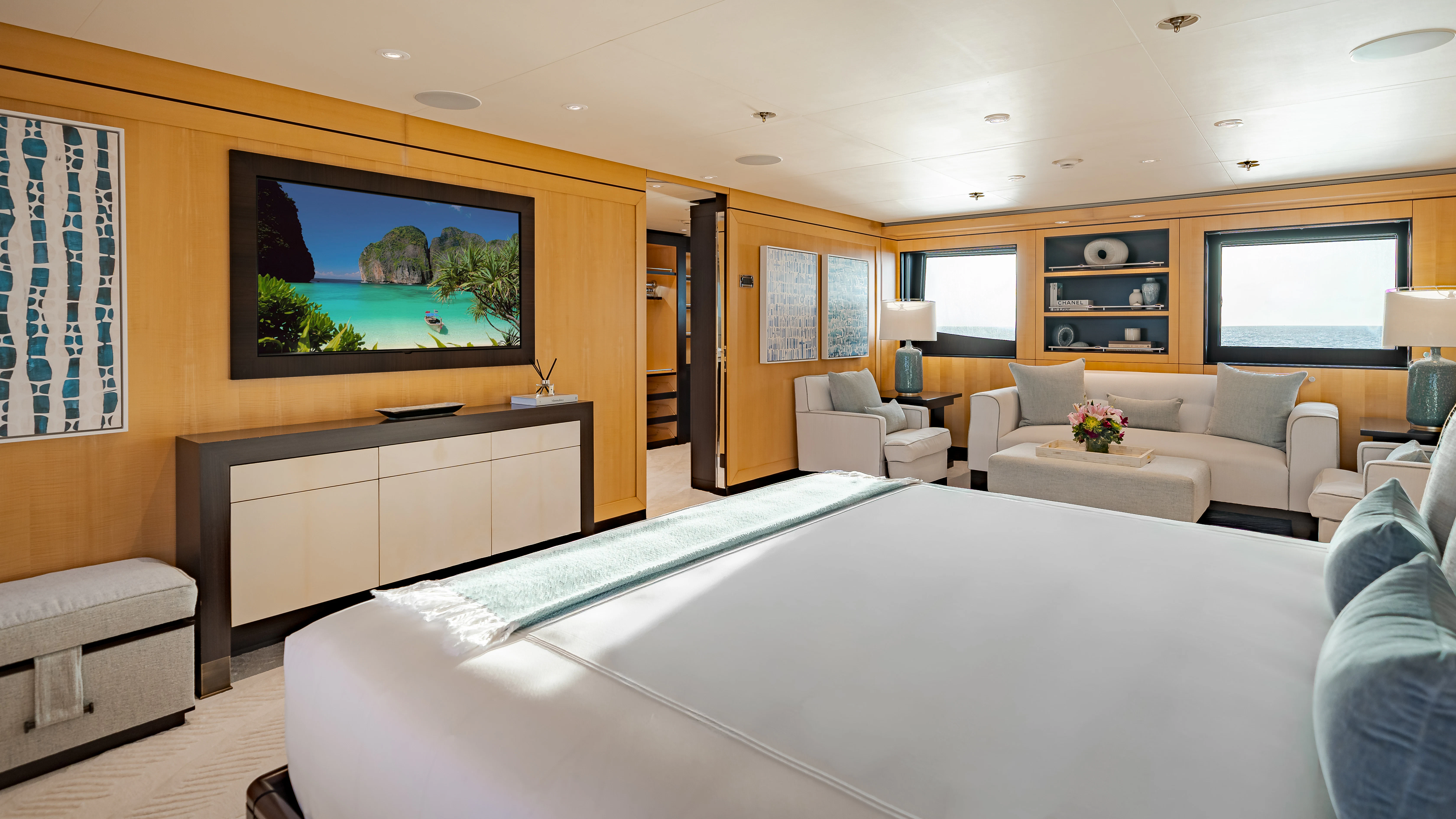 a large bedroom with a large bed aboard REVELRY Yacht for Charter
