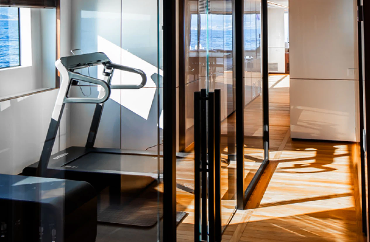 a black ladder in a room aboard CADA DIA Yacht for Charter