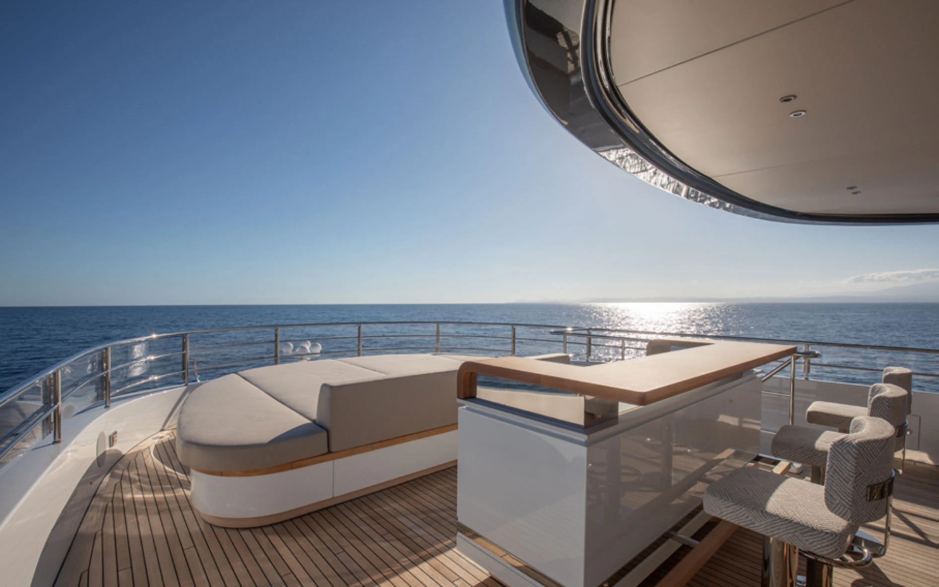 a balcony overlooking the ocean aboard CADA DIA Yacht for Charter