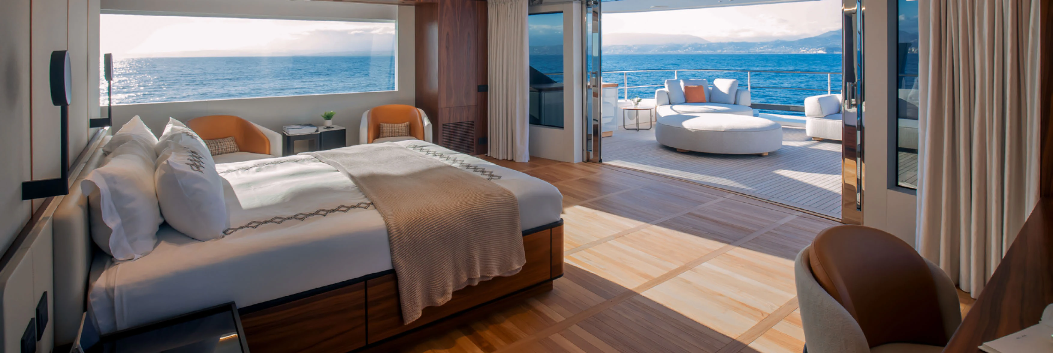 a large bed in a room aboard CADA DIA Yacht for Charter