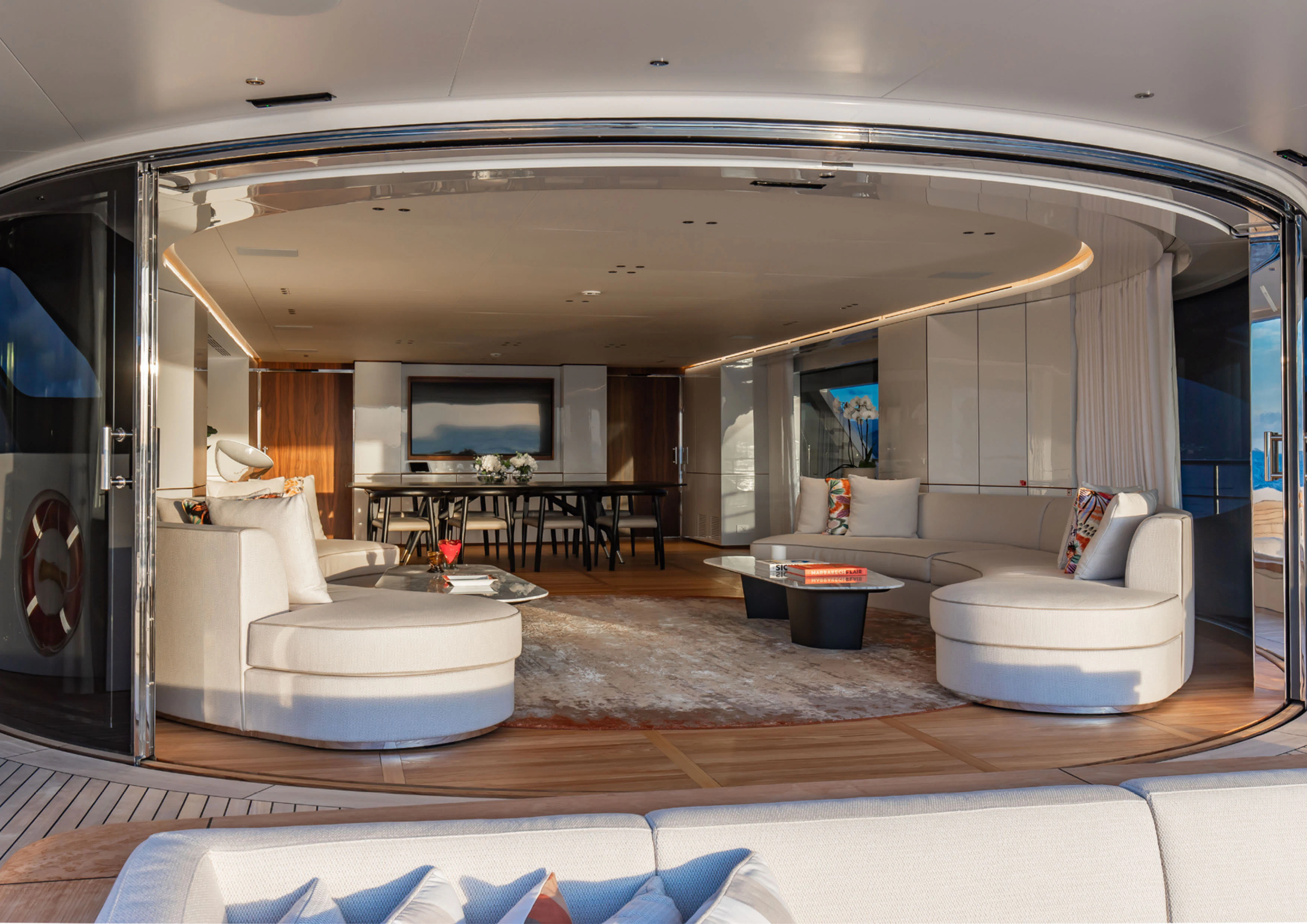a modern looking room with a large mirror aboard CADA DIA Yacht for Charter