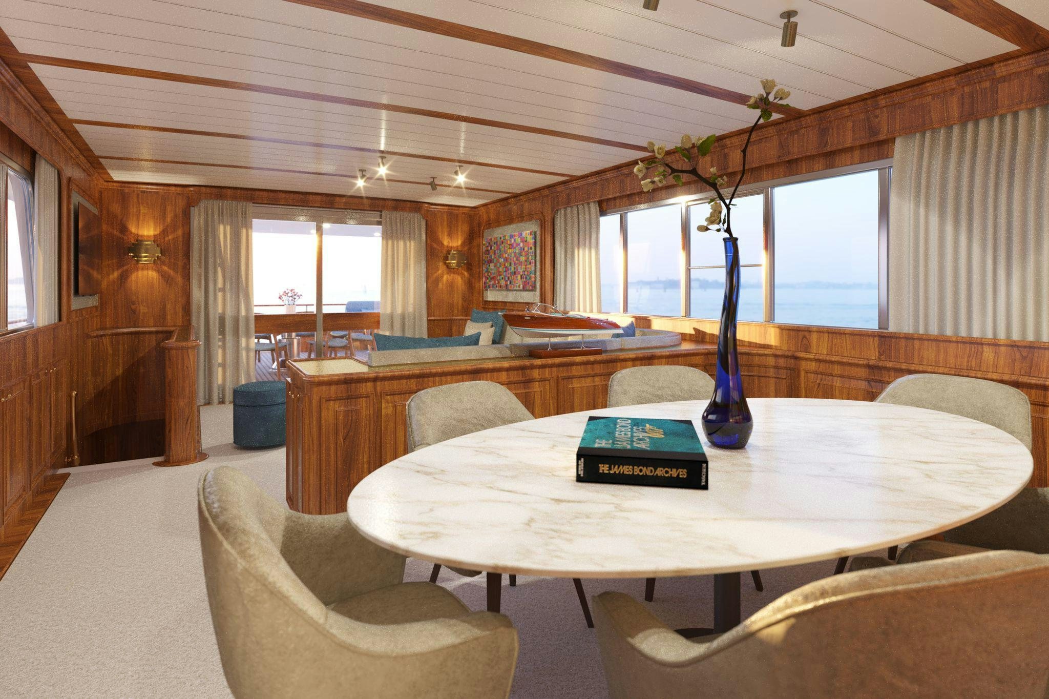 a room with a table chairs and a vase with flowers in it aboard A&A Yacht for Charter