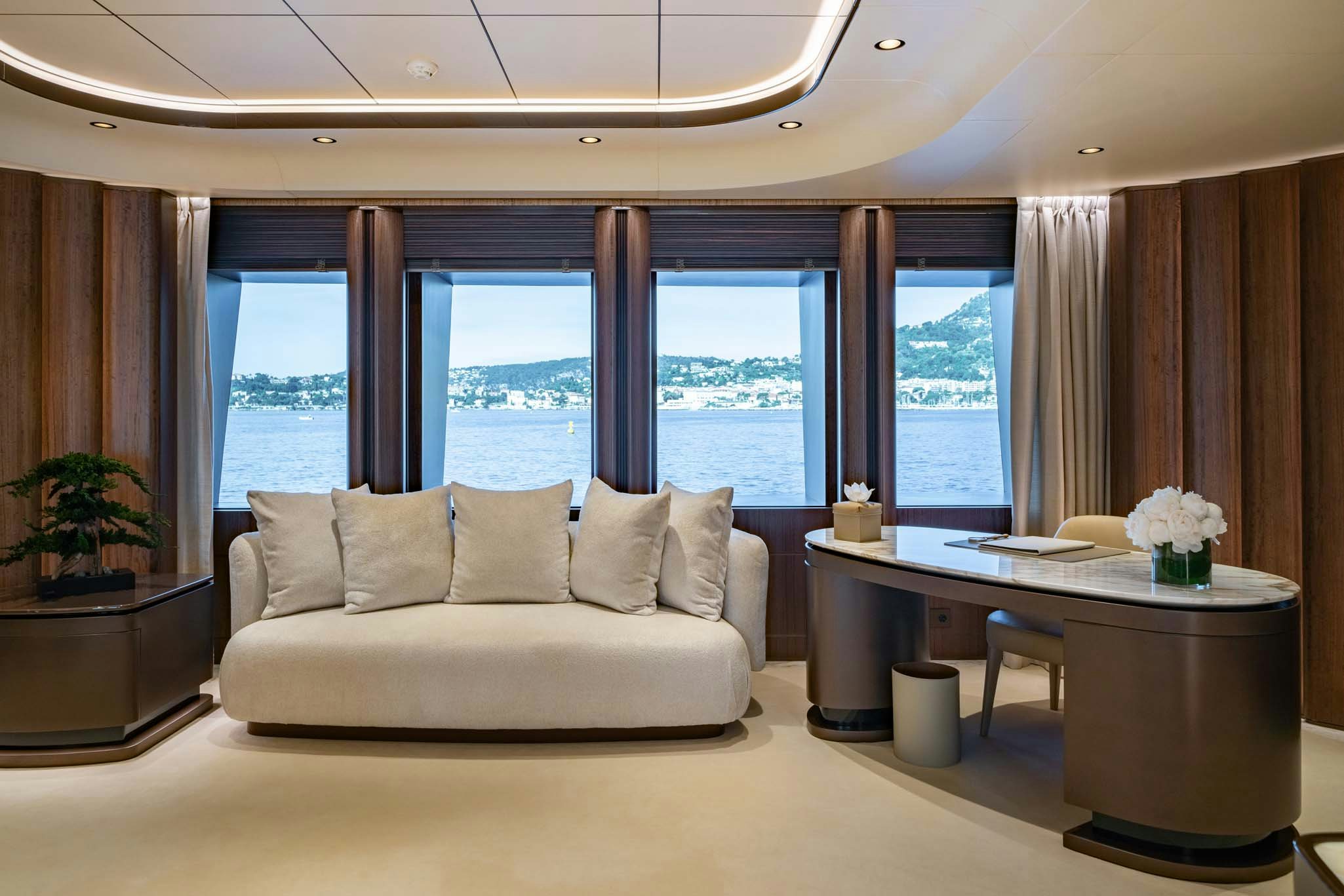 a living room with a couch and a table aboard MALIA Yacht for Charter