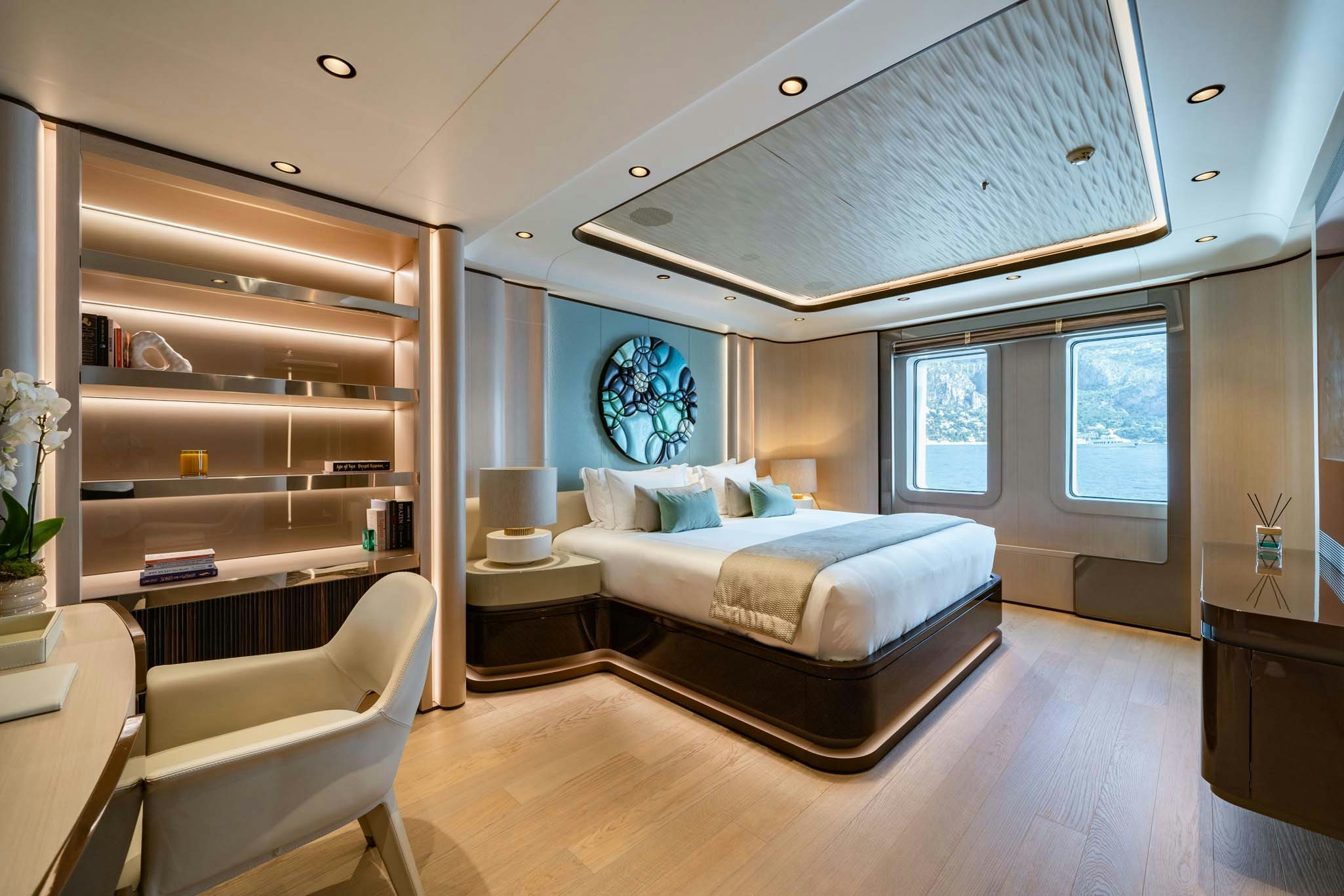 a bedroom with a large bed aboard MALIA Yacht for Charter