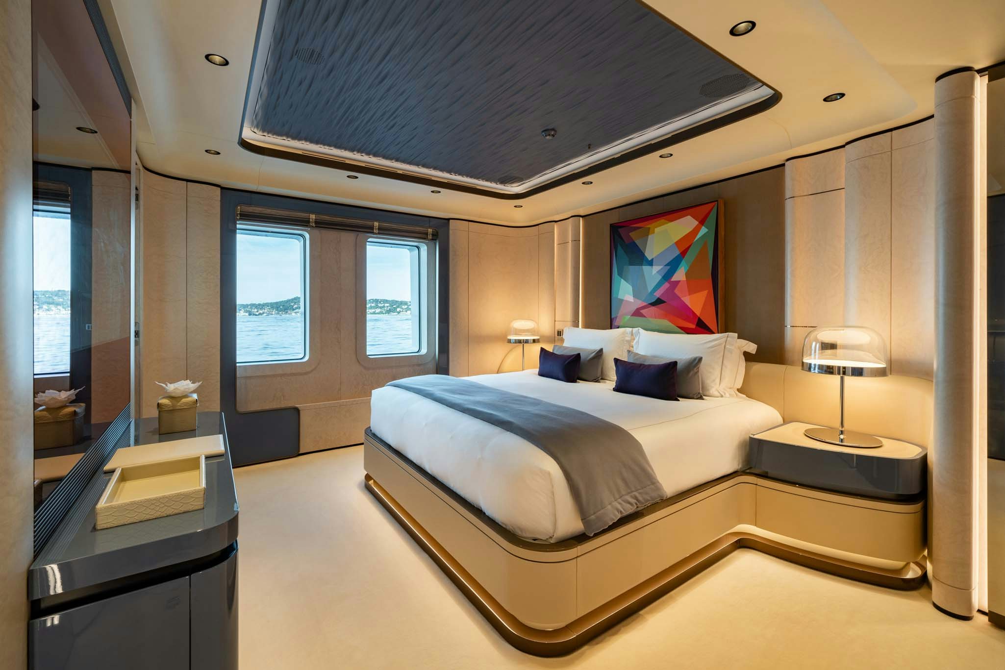 a bedroom with a large bed aboard MALIA Yacht for Charter