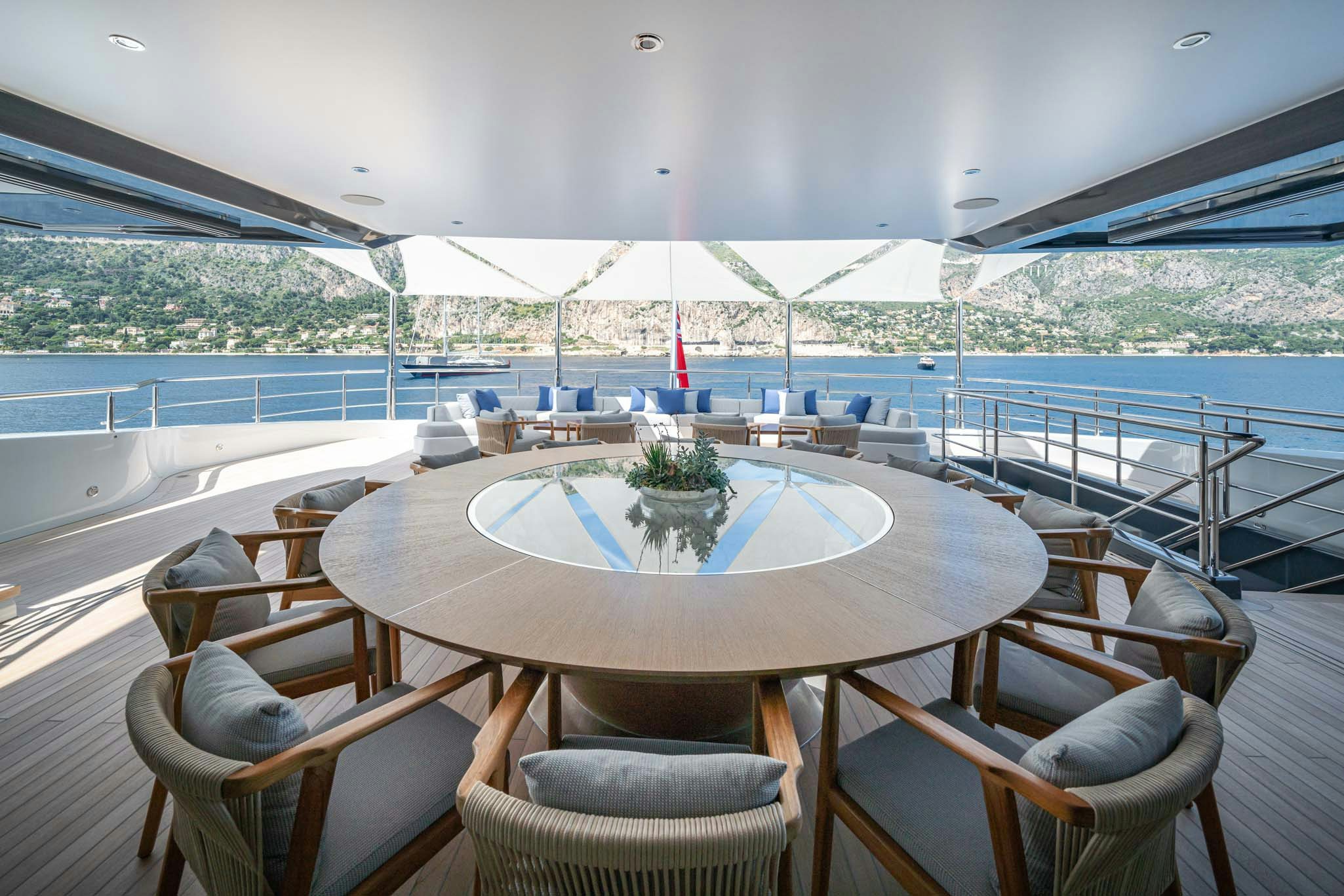 a table on a deck aboard MALIA Yacht for Charter