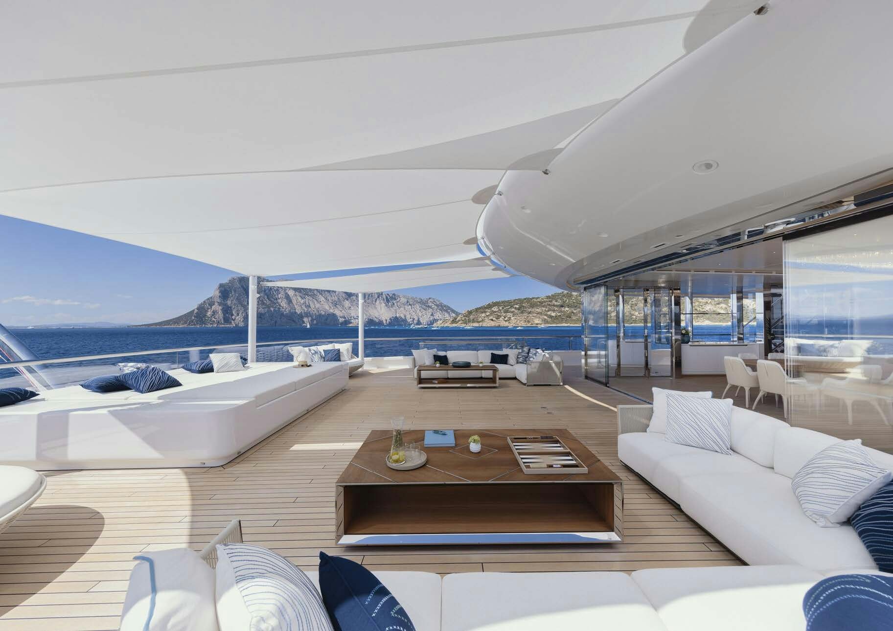 a modern looking living room with a large open window aboard H3 Yacht for Sale