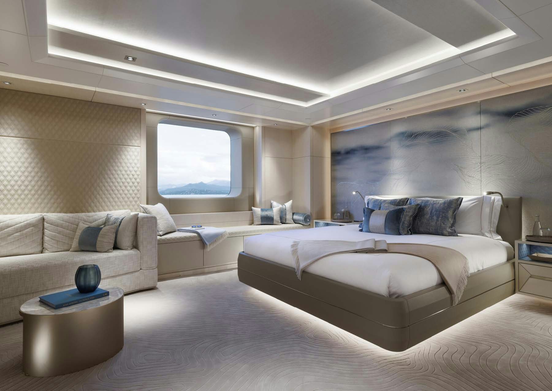 a room with a bed and a couch aboard H3 Yacht for Sale