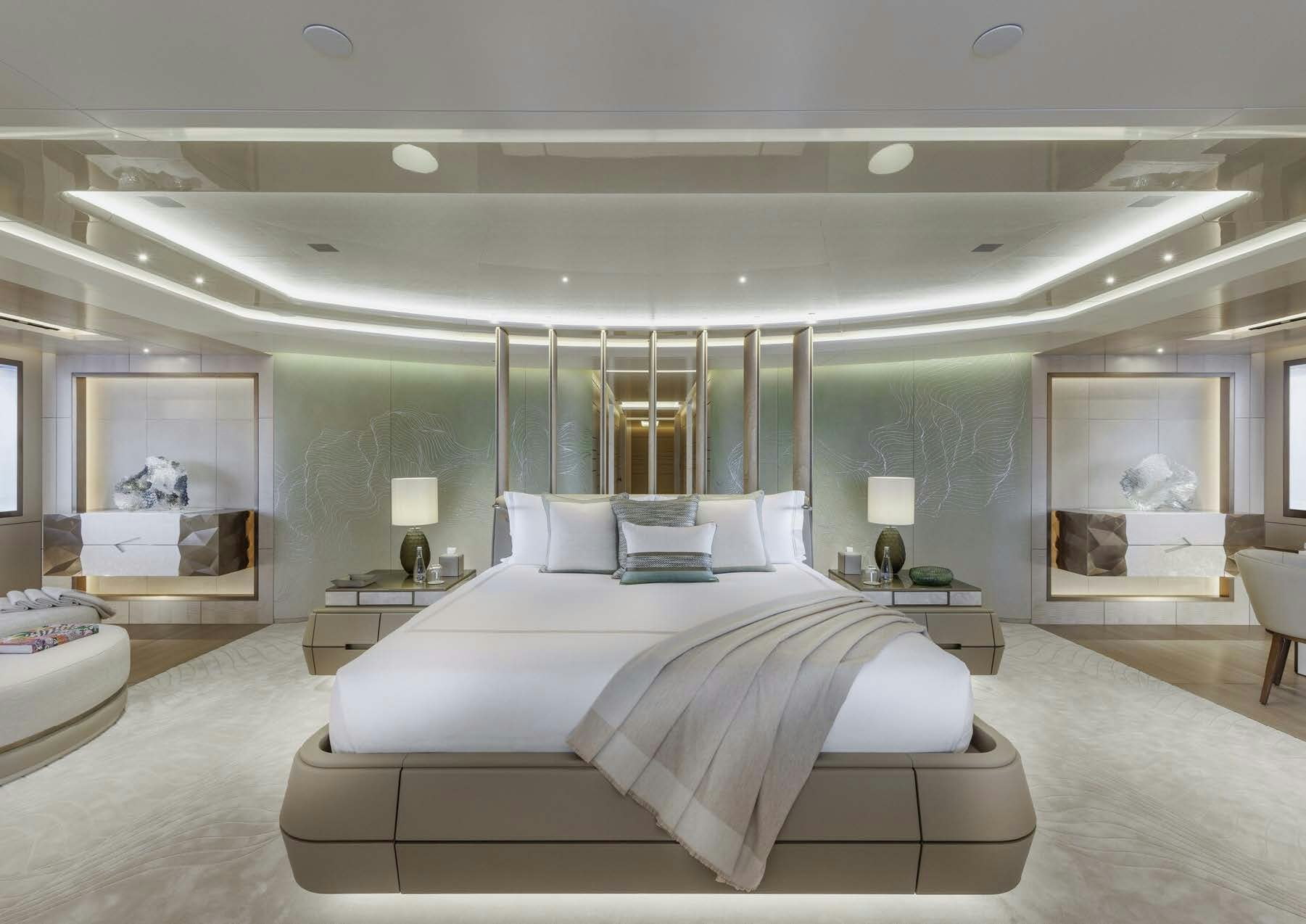 a large bedroom with a large bed aboard H3 Yacht for Sale