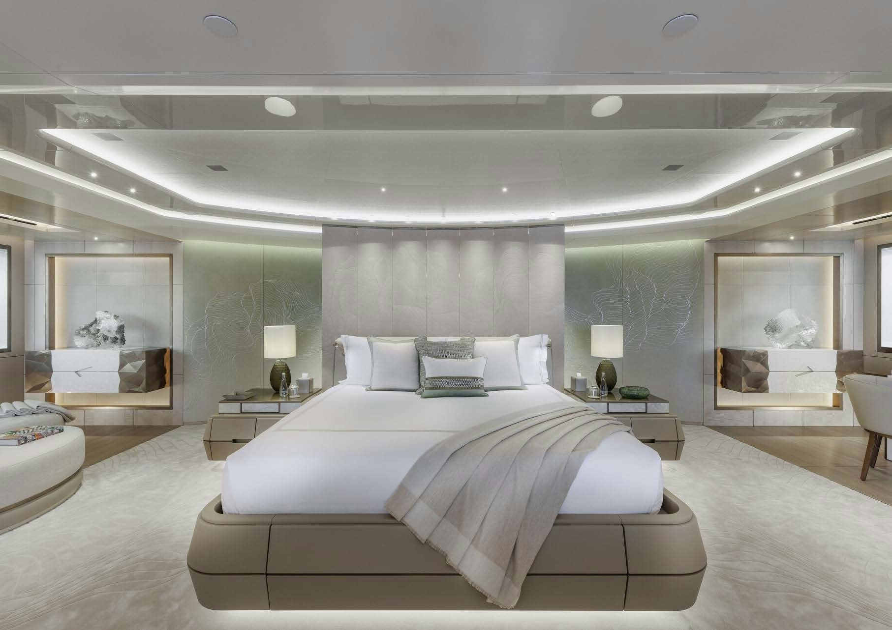 a large bedroom with a large bed aboard H3 Yacht for Sale