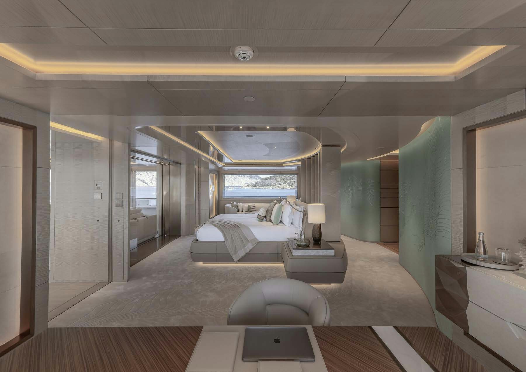 a room with a bed and a window aboard H3 Yacht for Sale