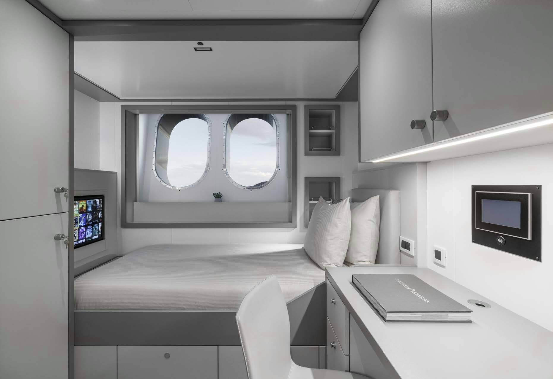 a small living room with a bed aboard H3 Yacht for Sale