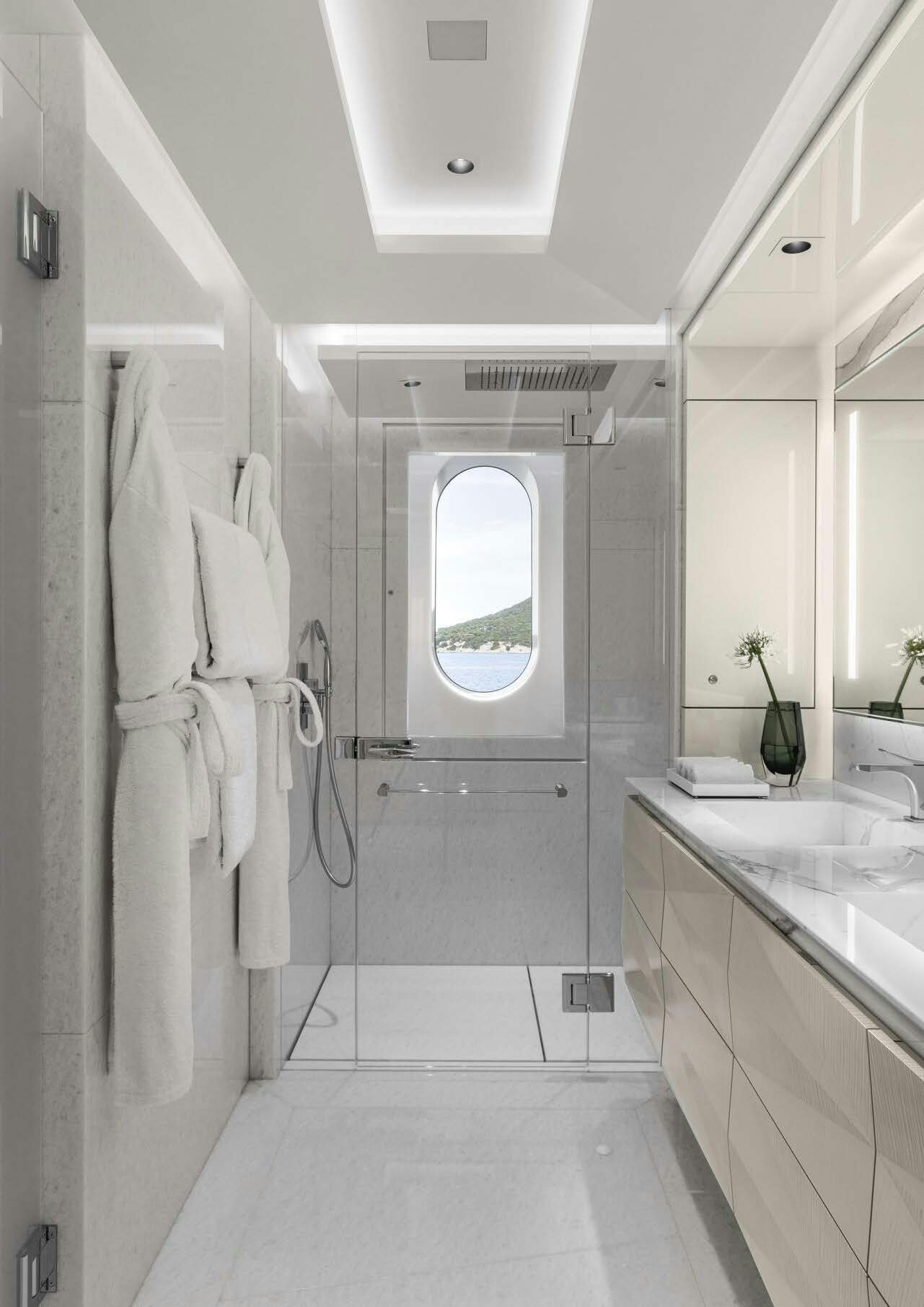 a bathroom with a sink and a mirror aboard H3 Yacht for Sale