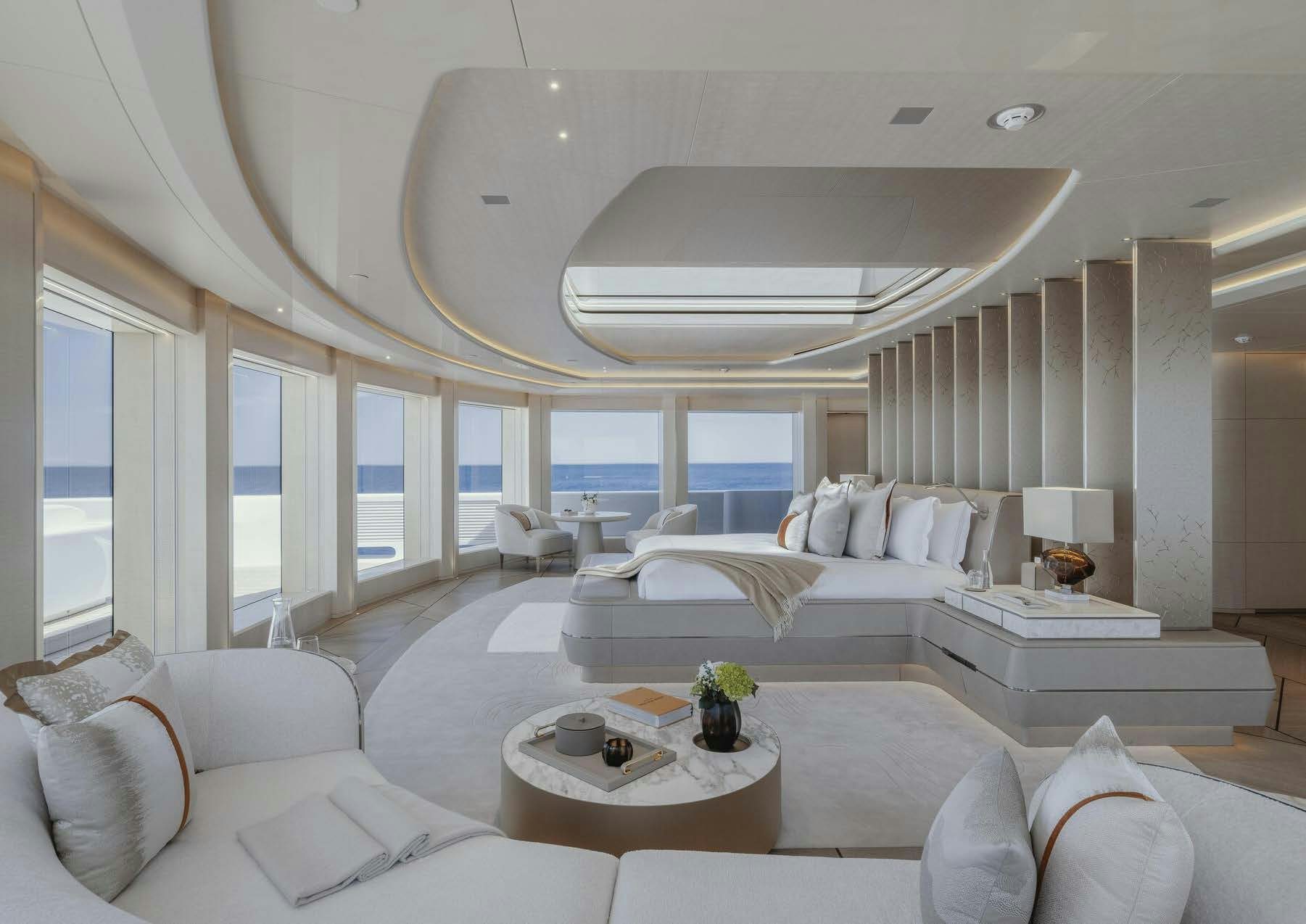 a large living room with a large open ceiling aboard H3 Yacht for Sale