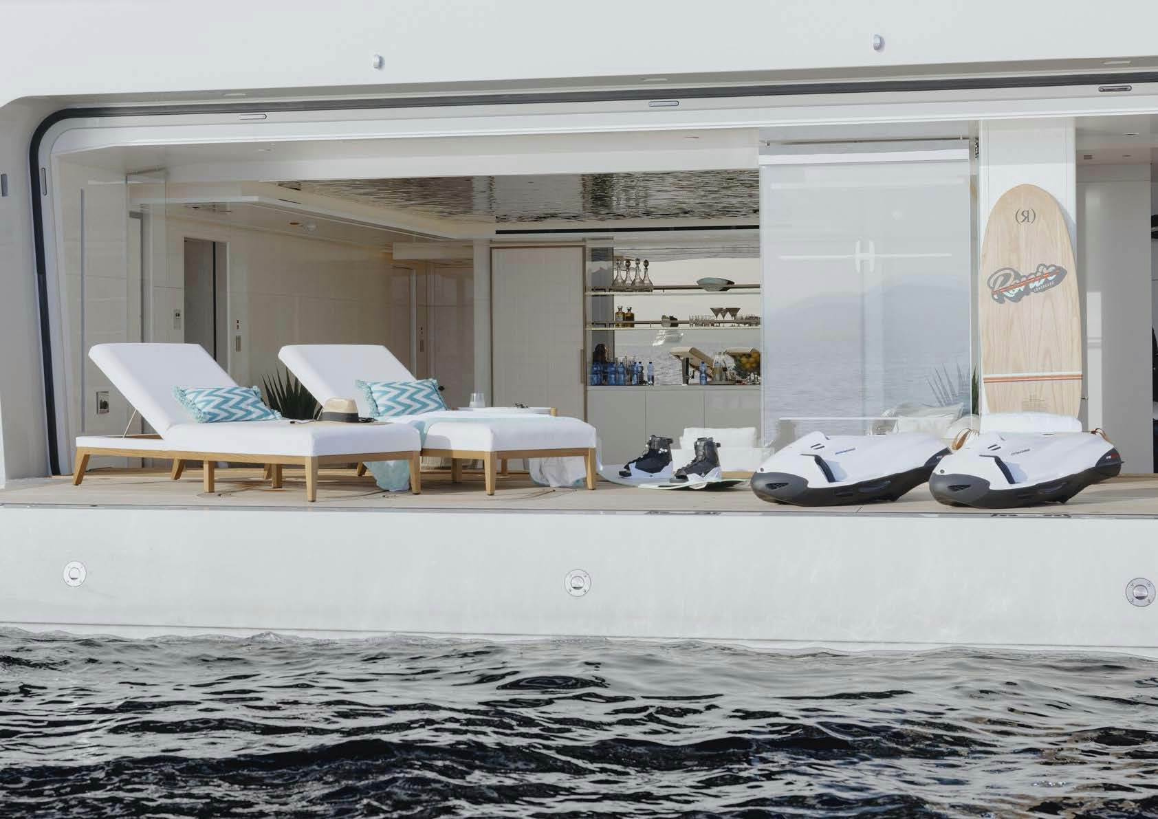 a room with a bed and a desk aboard H3 Yacht for Sale