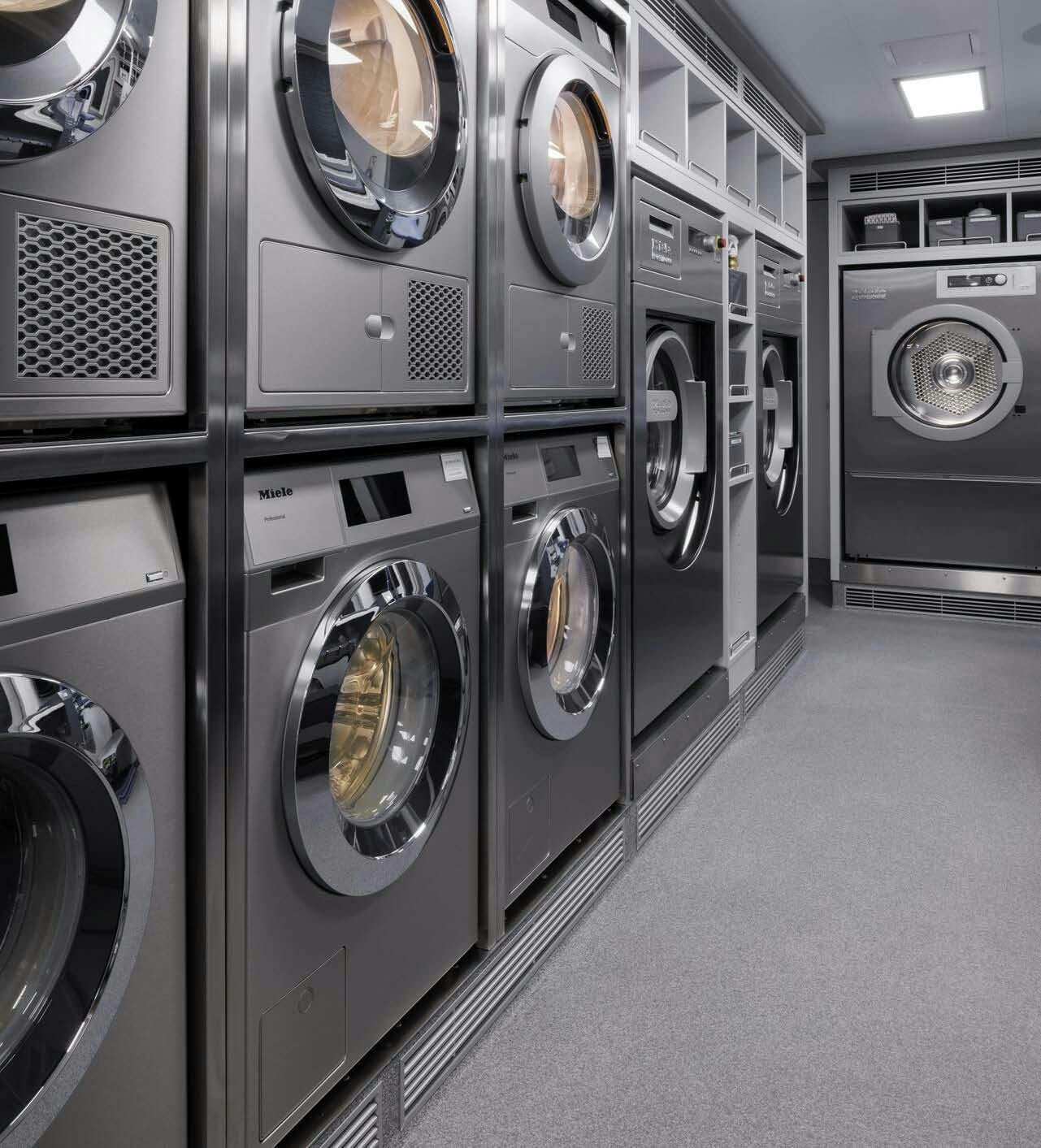 a room with many washers aboard H3 Yacht for Sale
