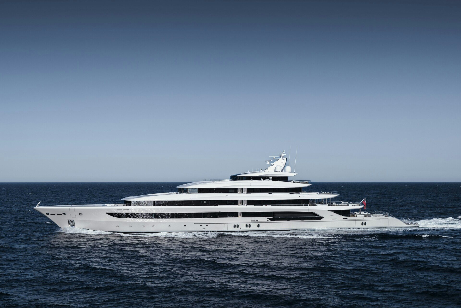 a large white yacht in the water aboard H3 Yacht for Sale