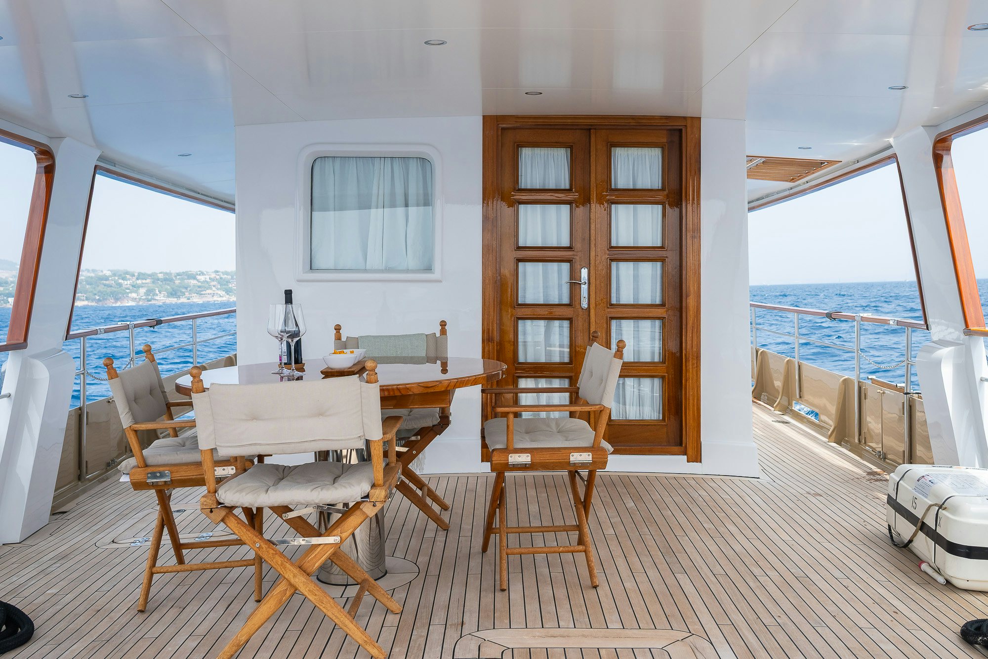 a dining room with a table and chairs aboard BLACK PEPPER Yacht for Sale