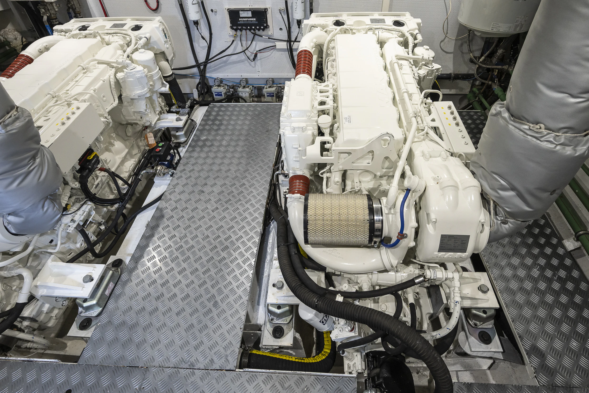a machine with a large metal cylinder aboard BLACK PEPPER Yacht for Sale