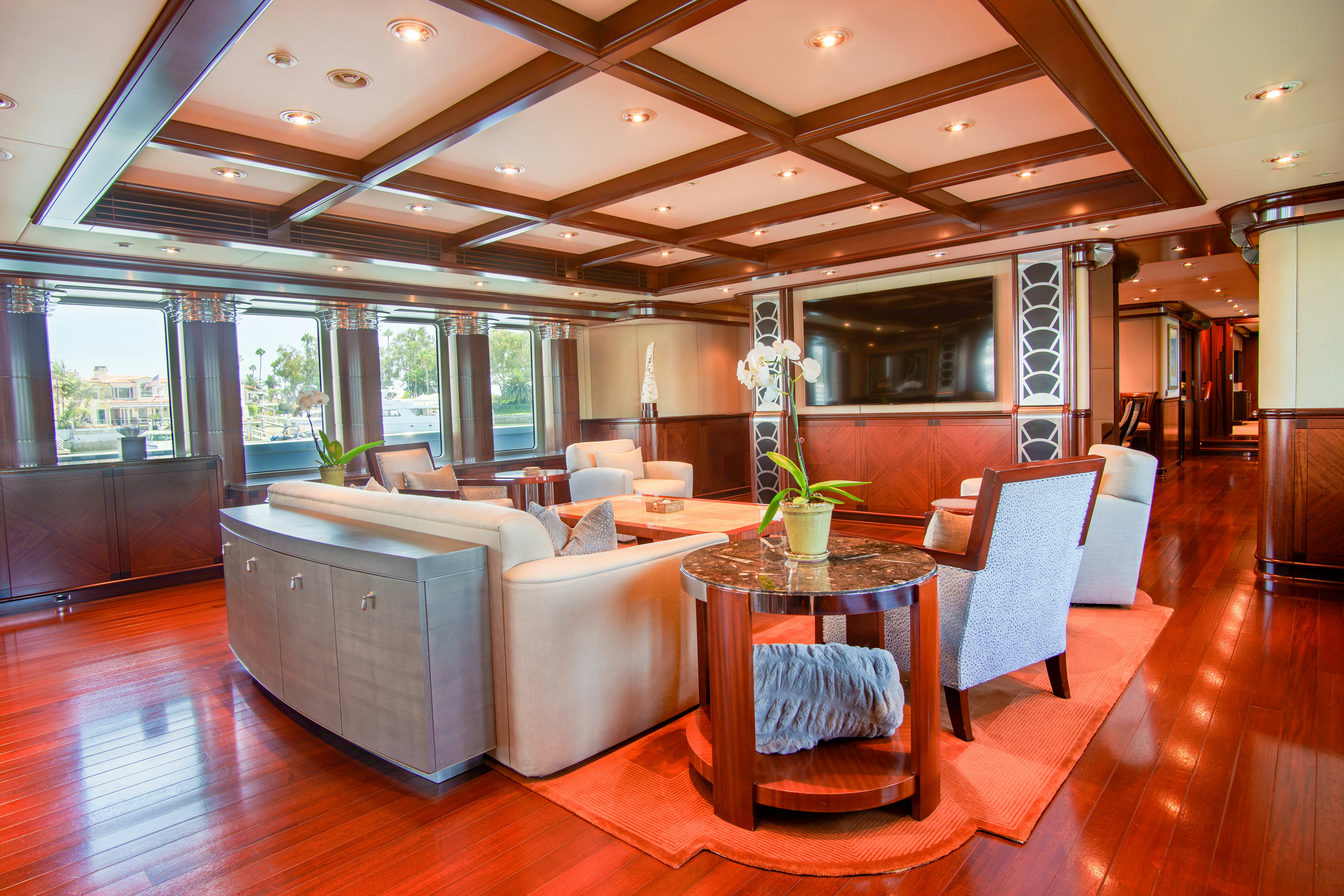 a living room with a large open floor plan aboard TRITON Yacht for Charter