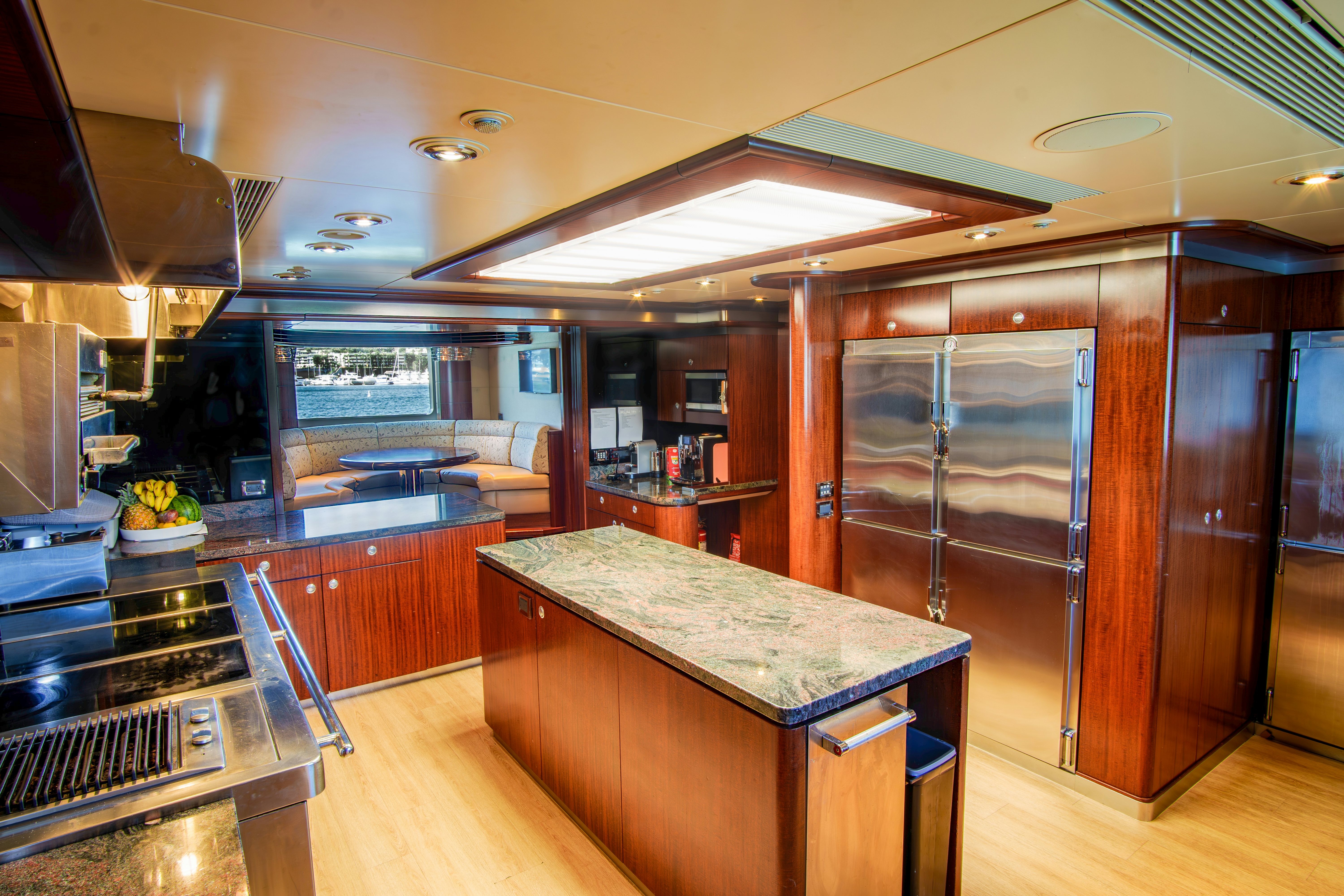 a kitchen with a bar and a bar aboard TRITON Yacht for Charter