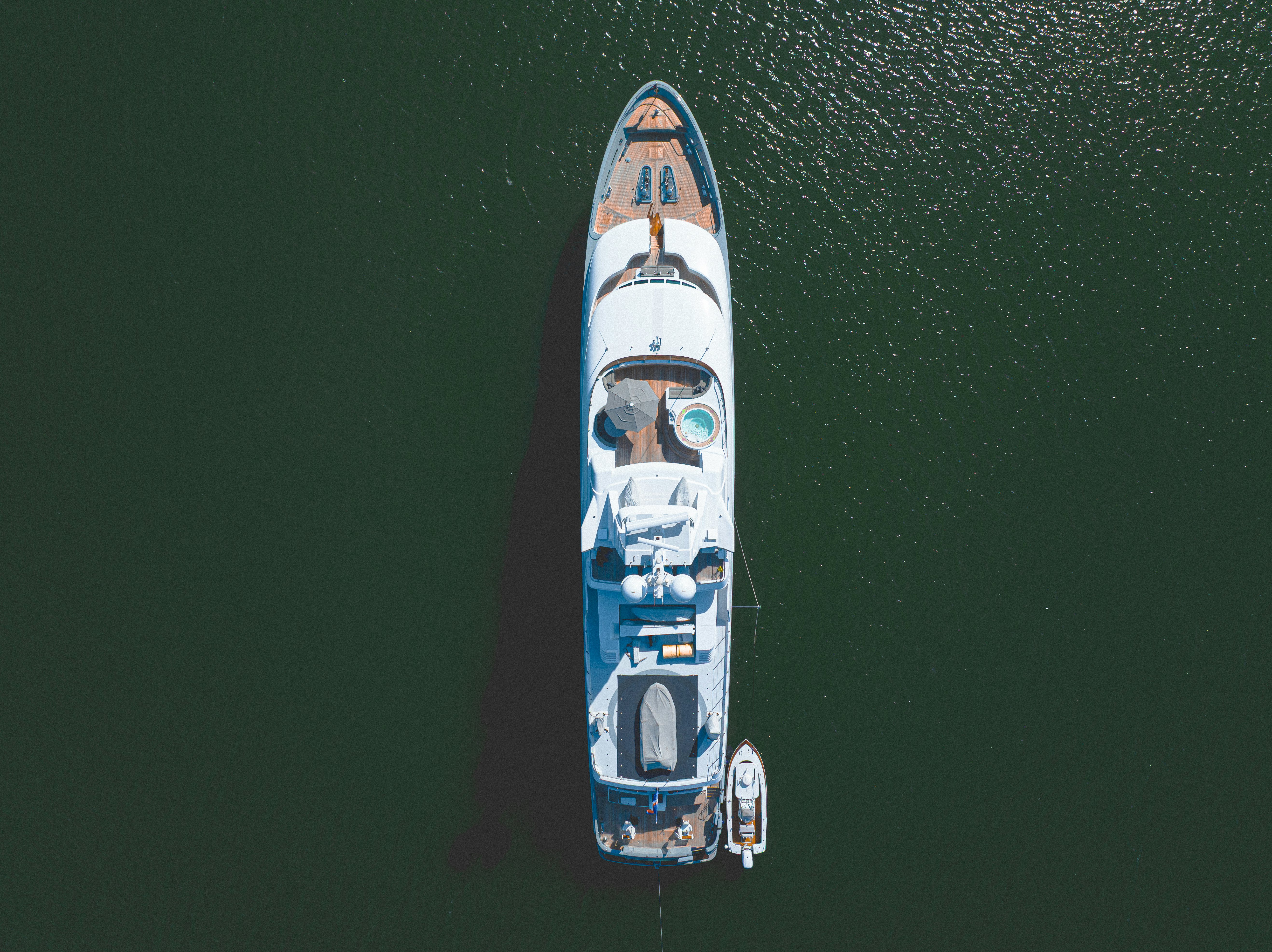 a sports jersey on a green background aboard TRITON Yacht for Charter