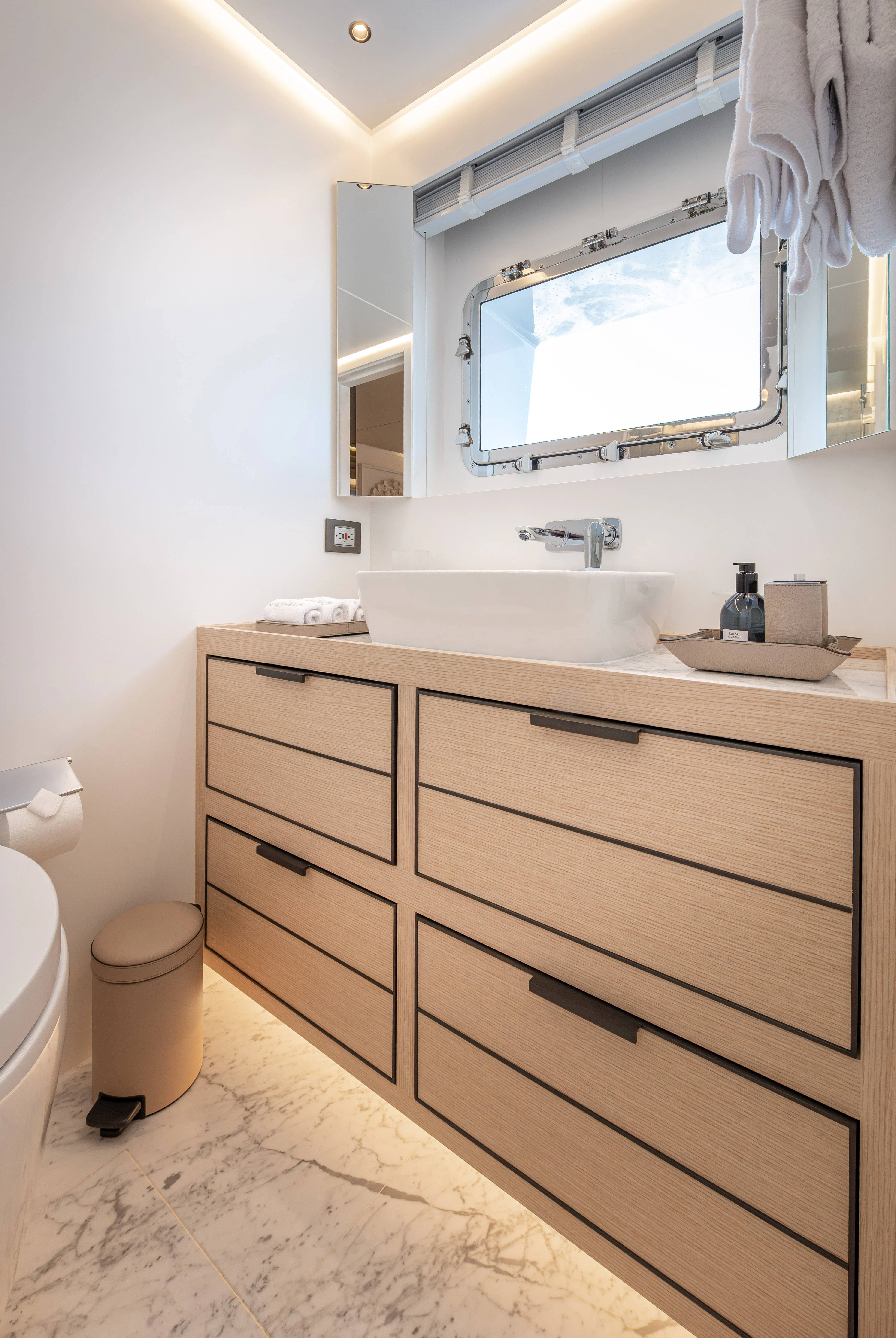 a bathroom with a sink and a mirror aboard ORPHEUS Yacht for Sale
