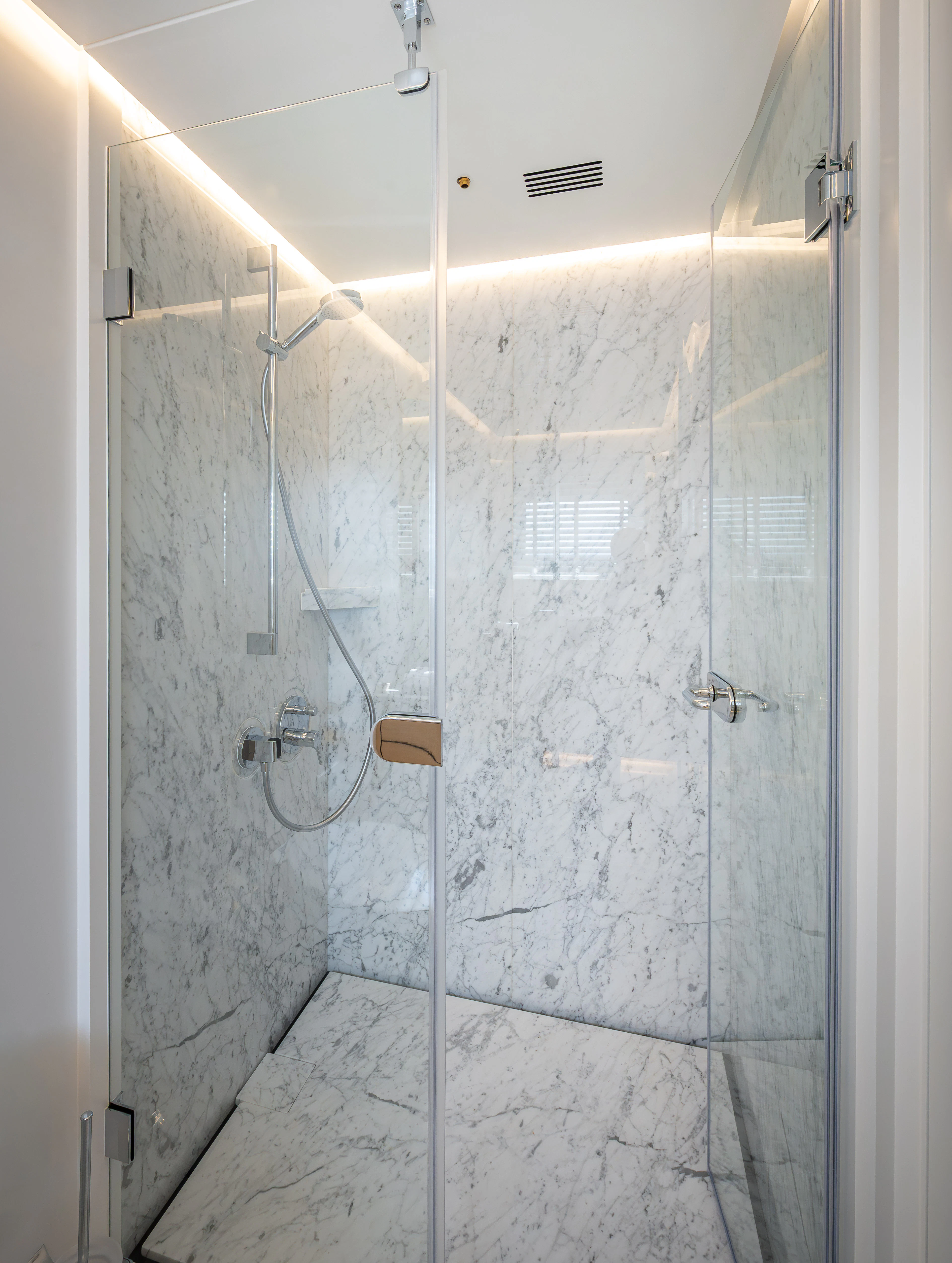 a shower with glass doors aboard ORPHEUS Yacht for Sale