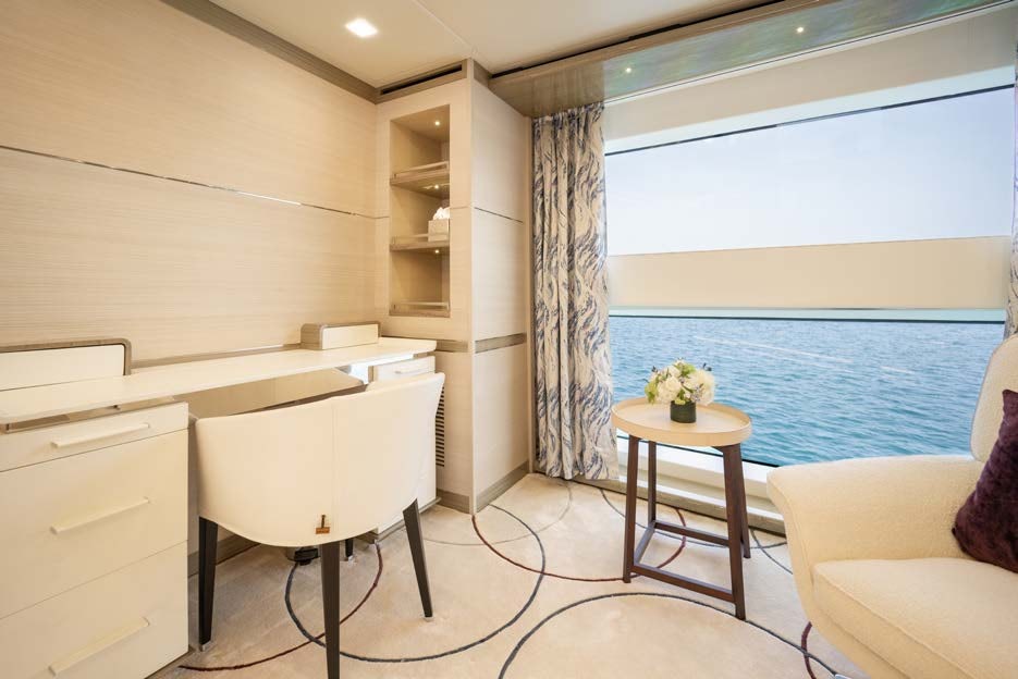 a room with a desk and a window aboard CHARADE Yacht for Charter