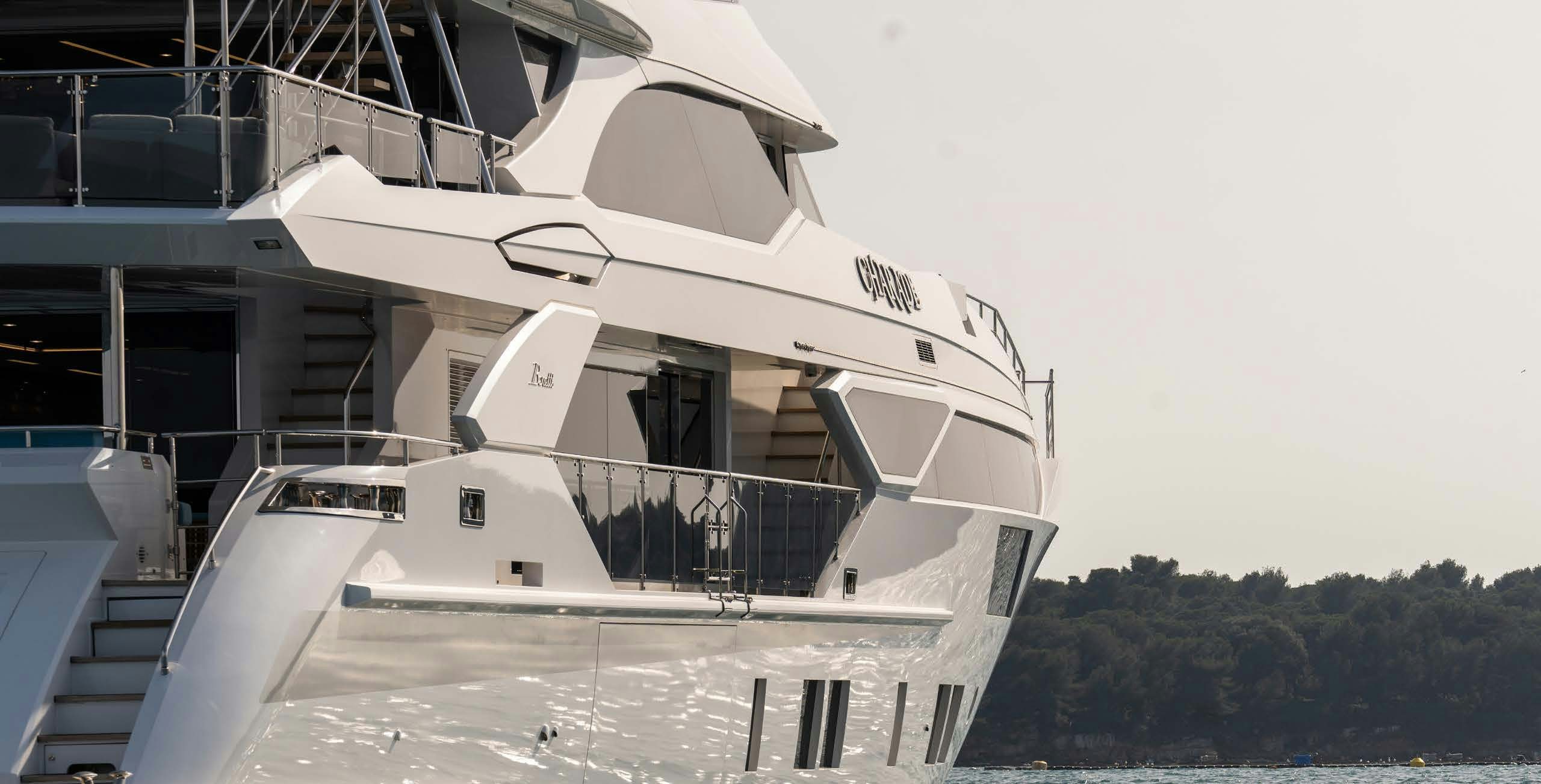 a white yacht docked aboard CHARADE Yacht for Charter