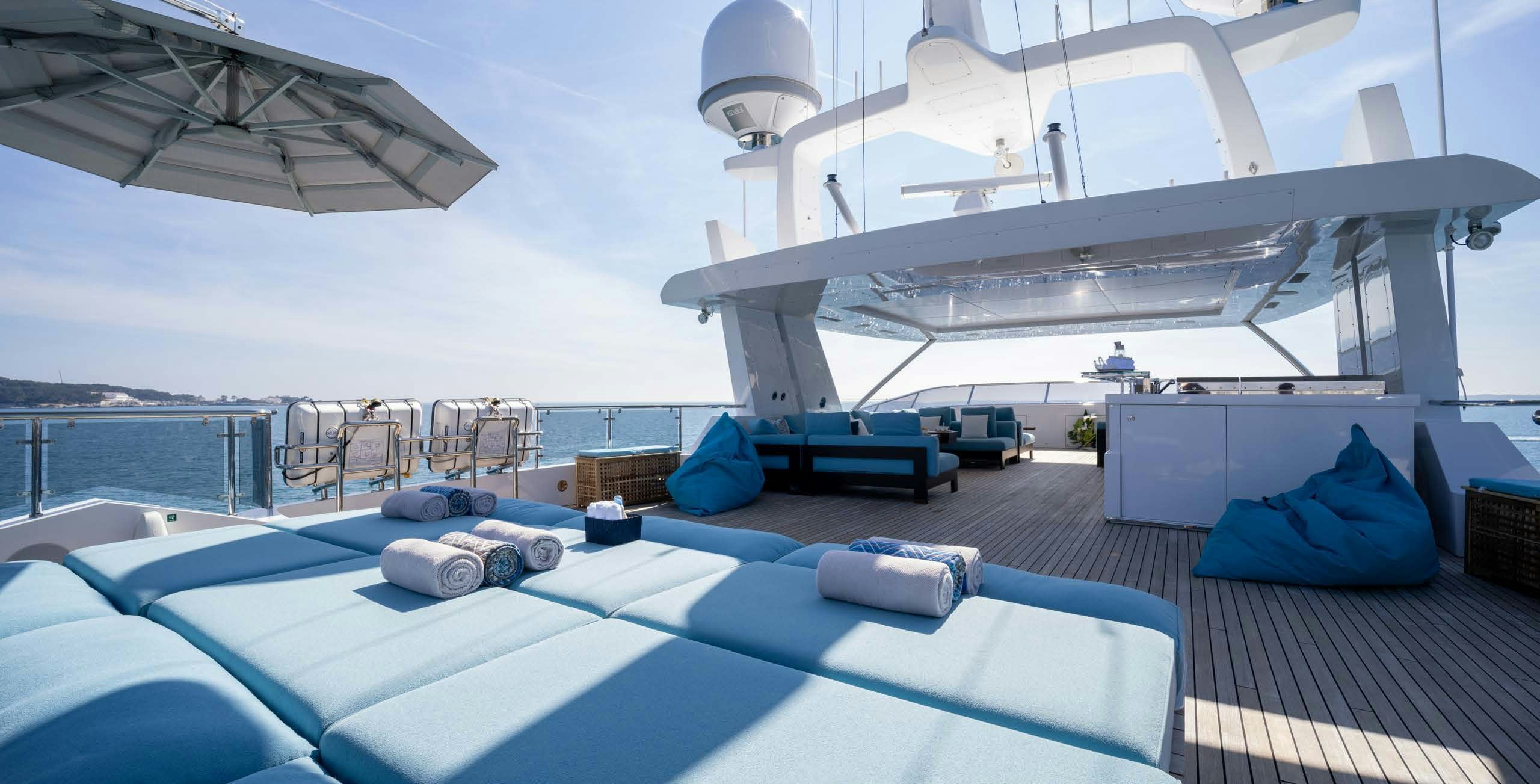 a large white boat on a boat aboard CHARADE Yacht for Charter
